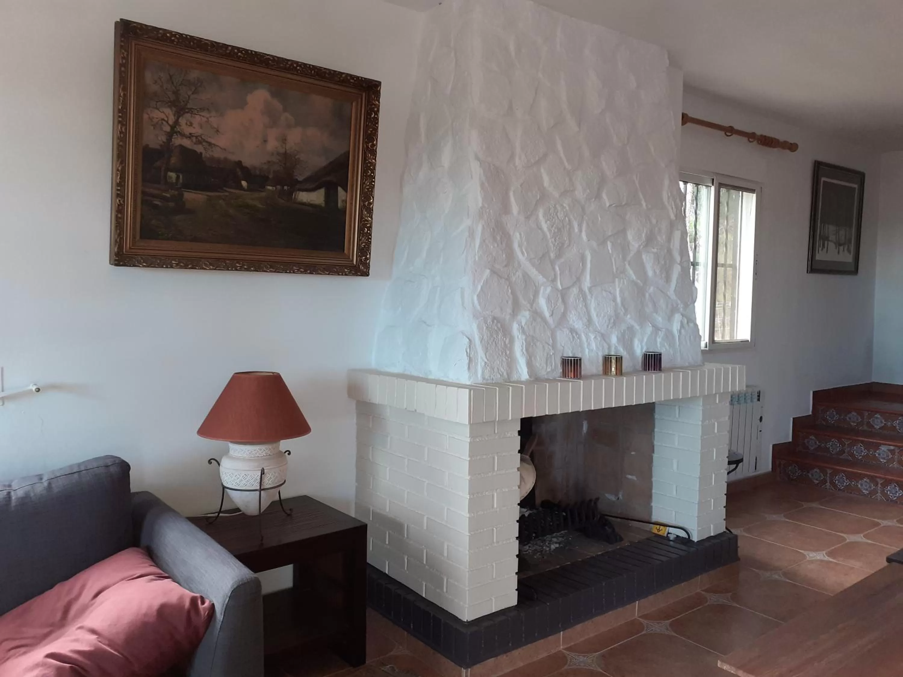 Communal lounge/ TV room, TV/Entertainment Center in Casa Loro Loco B&B