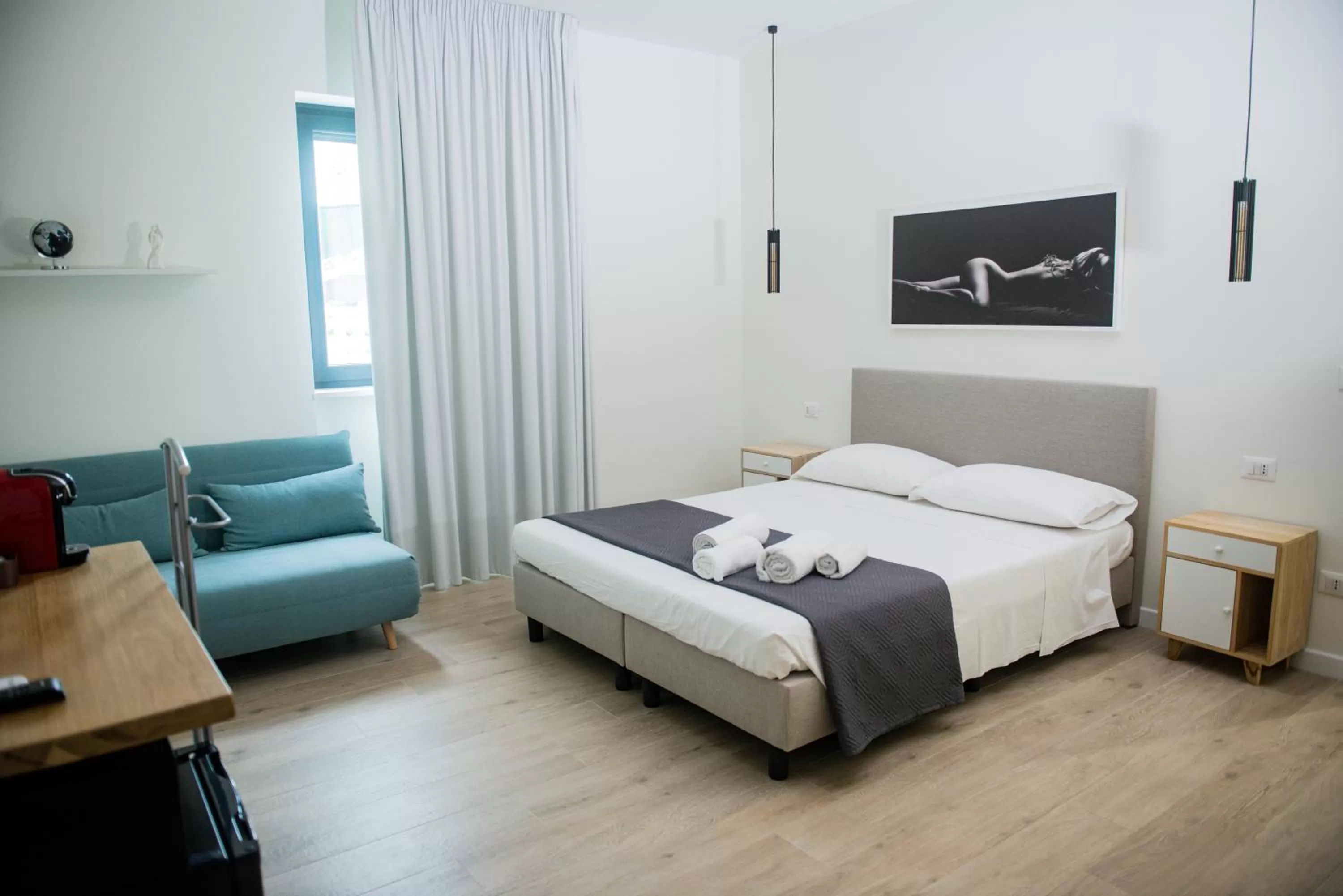 Photo of the whole room, Bed in Divina Perla