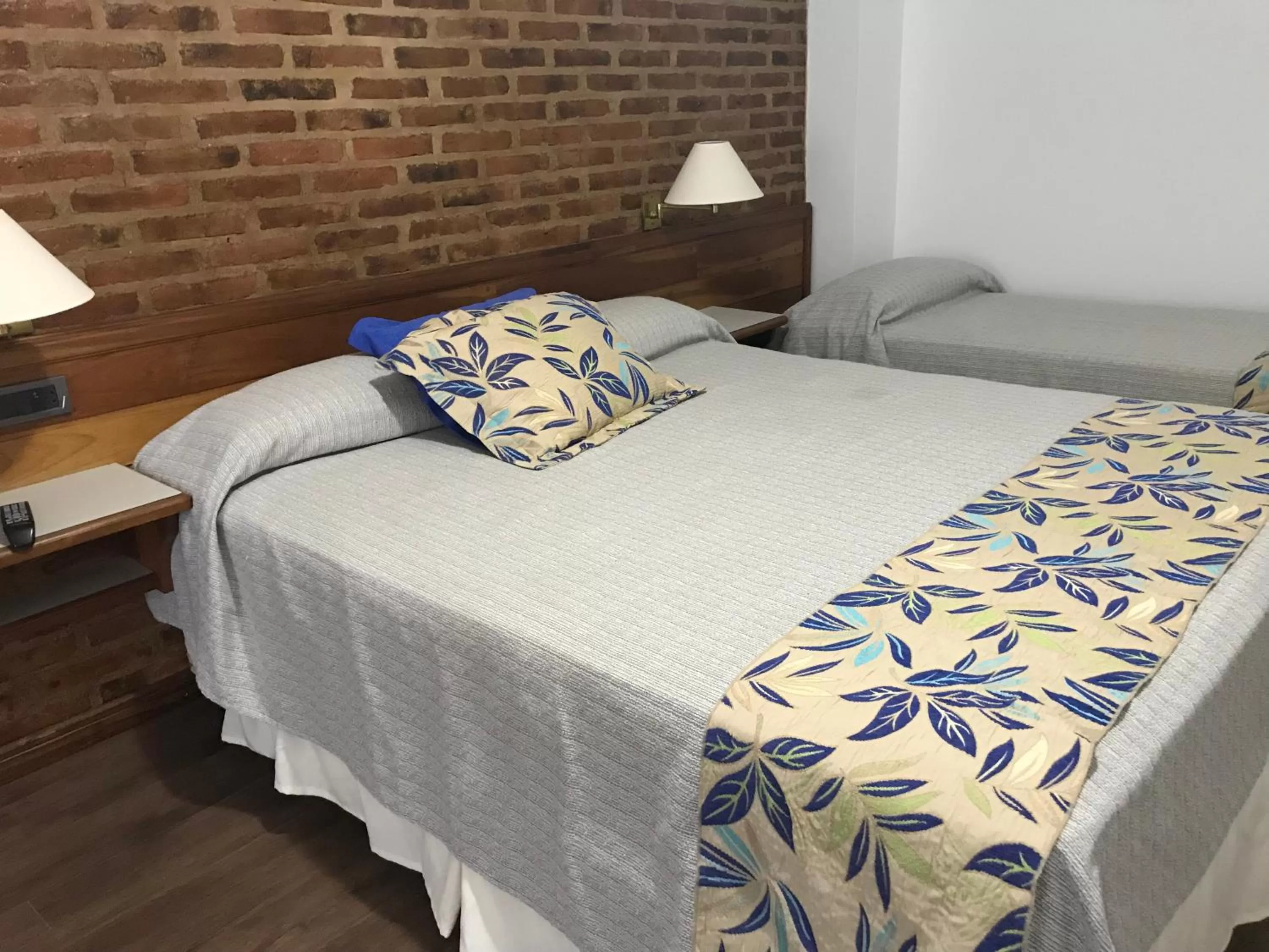 Bed in Costanera Mar Hotel & Suites