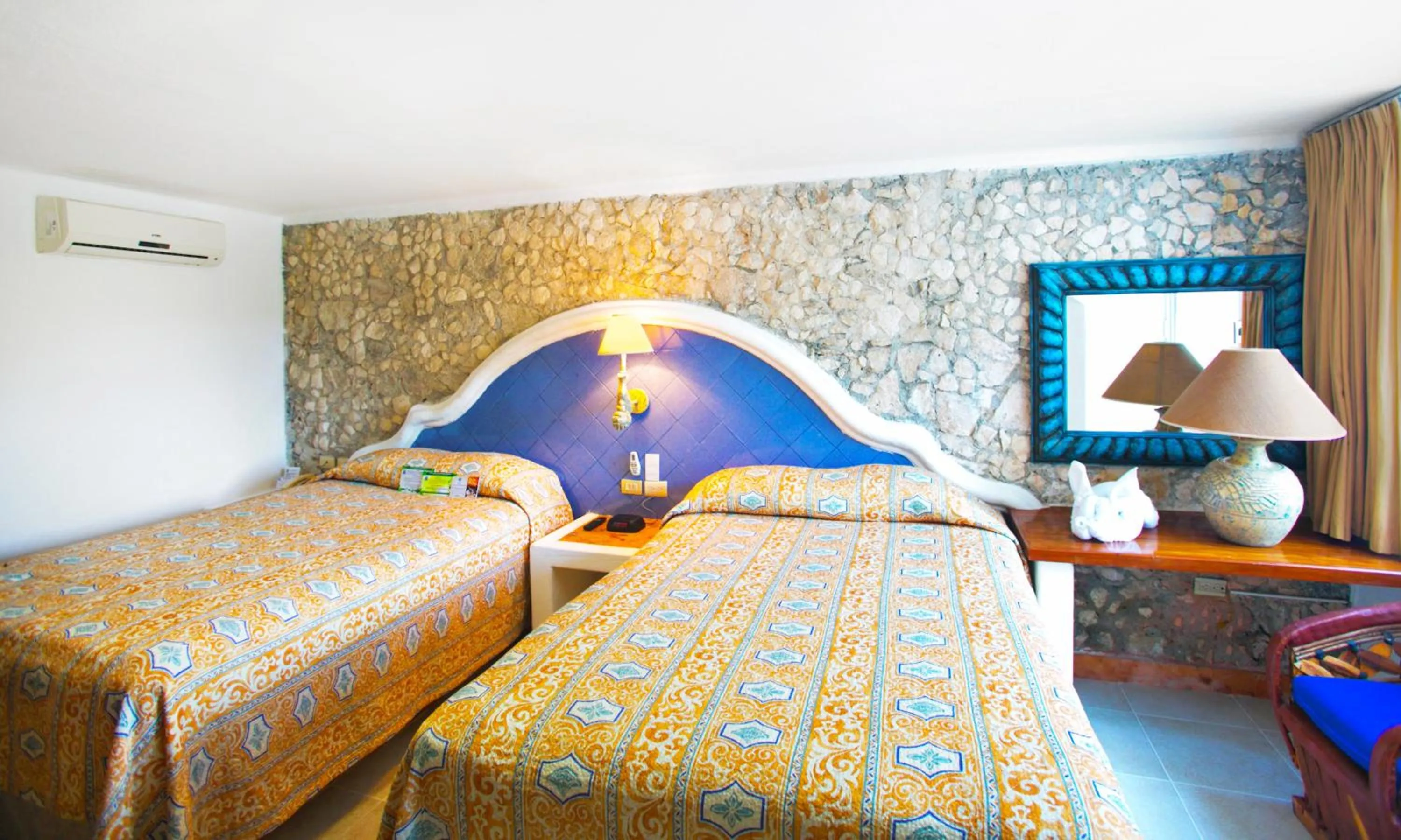 Bedroom, Bed in Casa del Mar Cozumel Hotel & Dive Resort with free access to an exclusive beach club