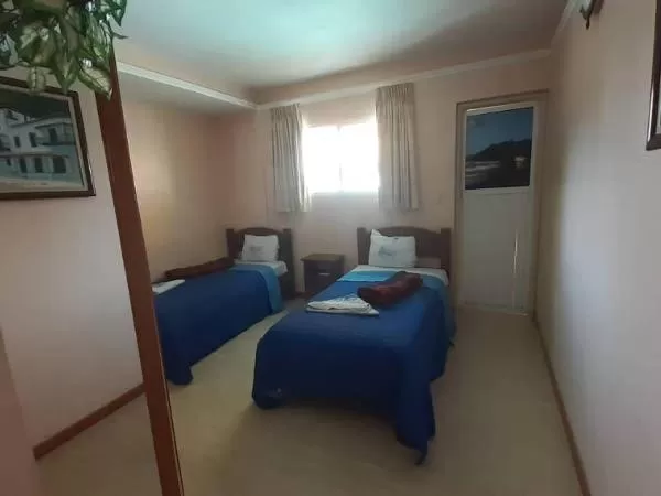 Bed in HOTEL MUEVETE POR VARGAS