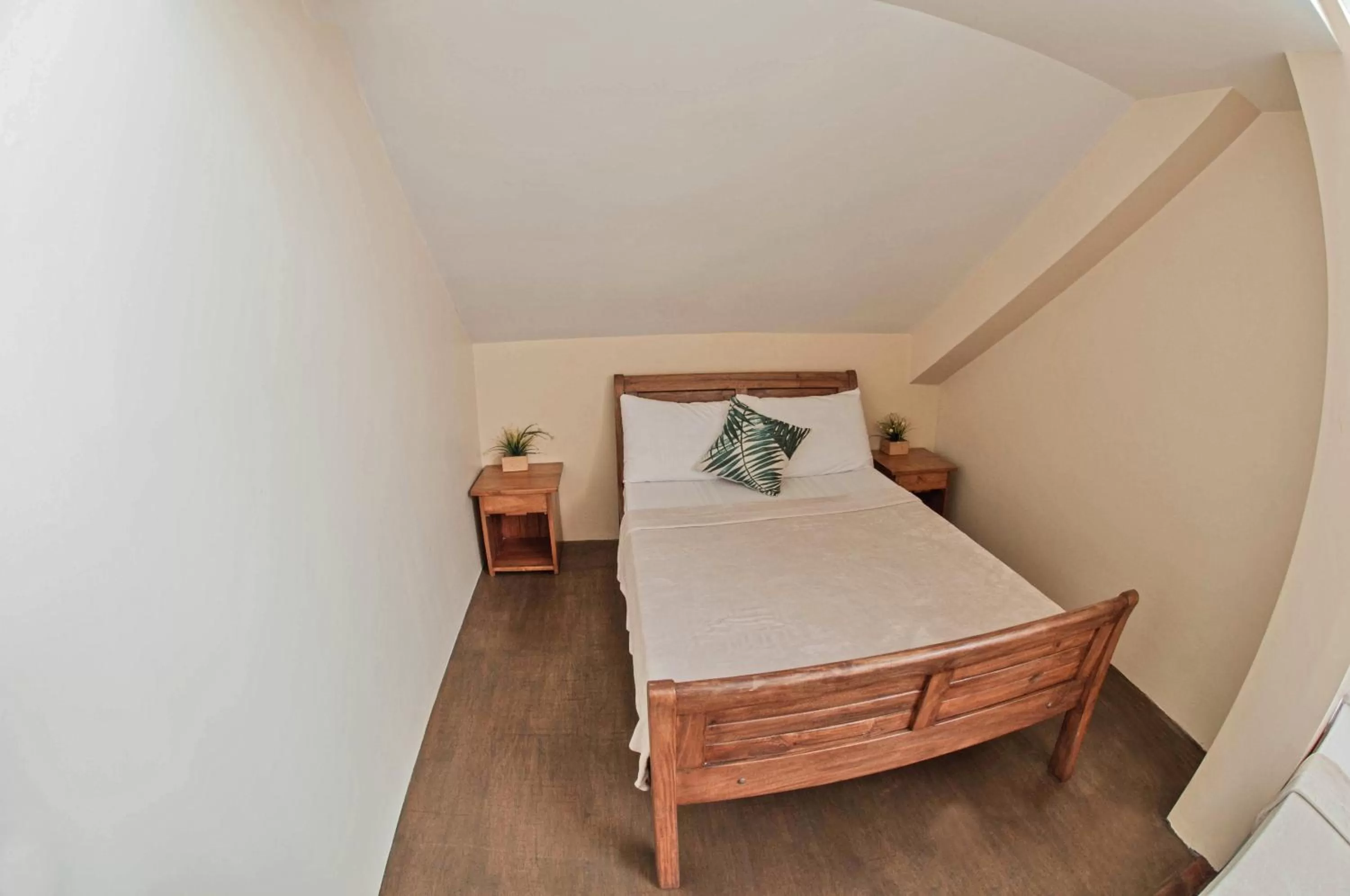 Bed in The Half House by Elmar Cabin