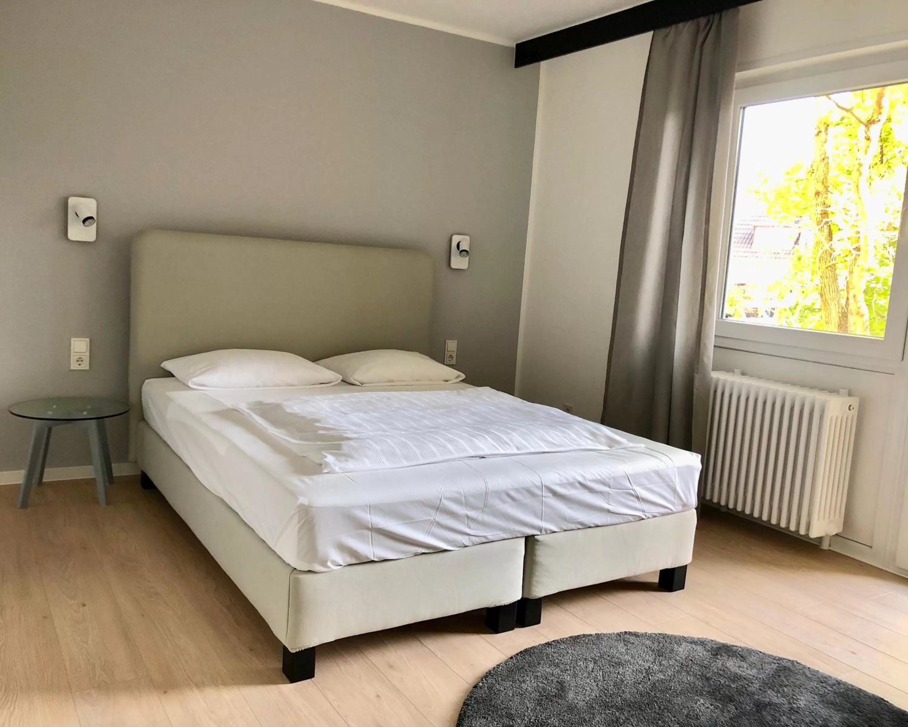 Bed in City Hotel und City Apartments Centrum