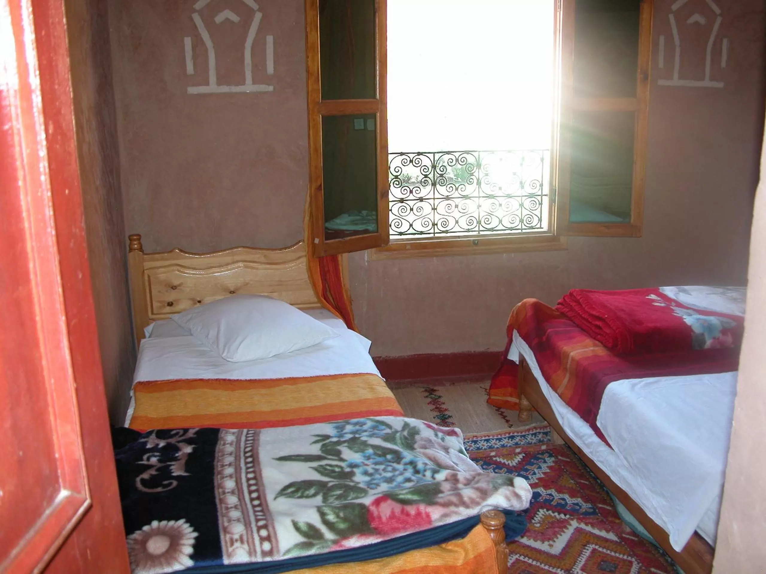 Bed in Maison d'Hôte Valentine