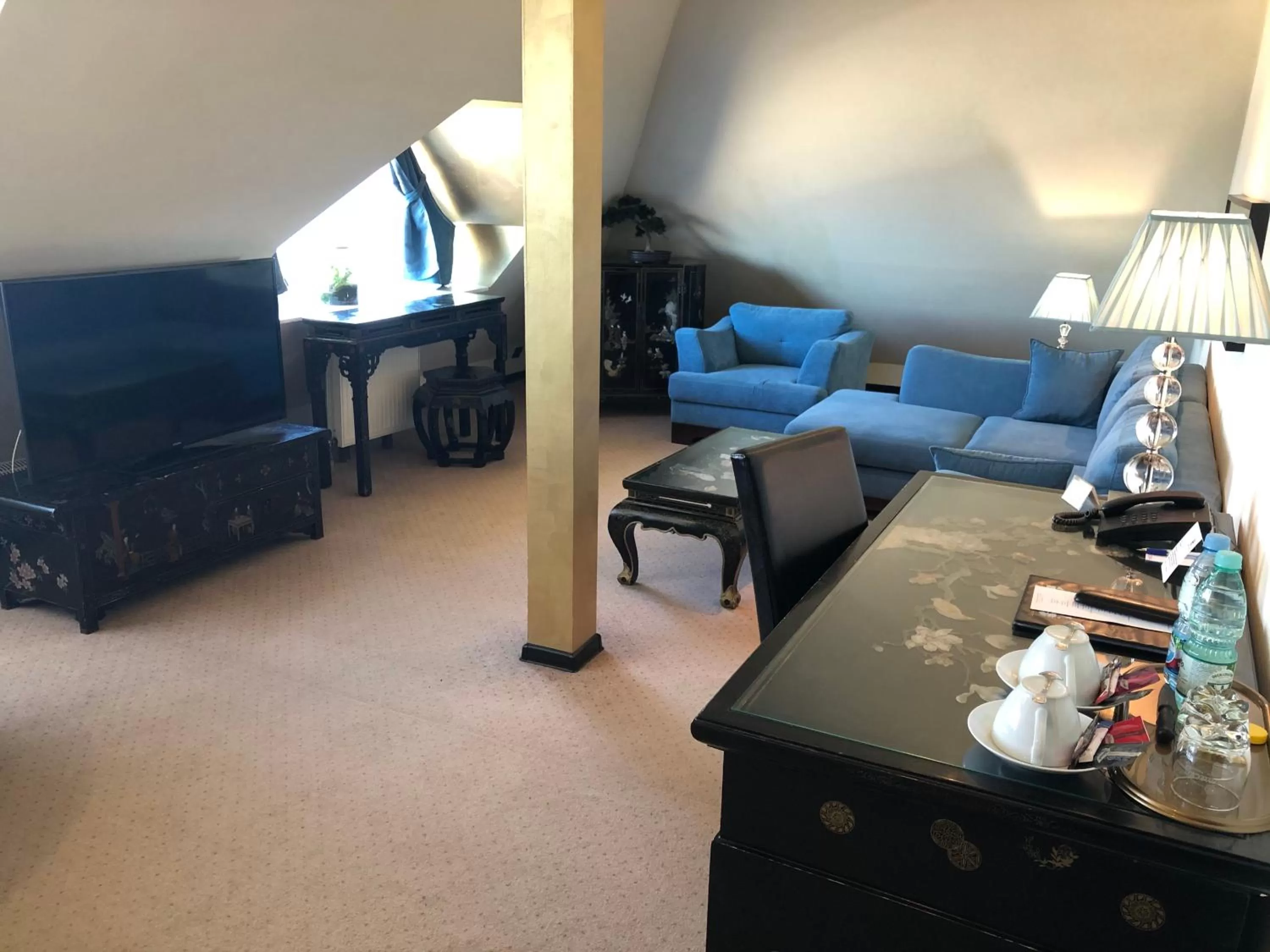 Living room in Hotel Zhong Hua