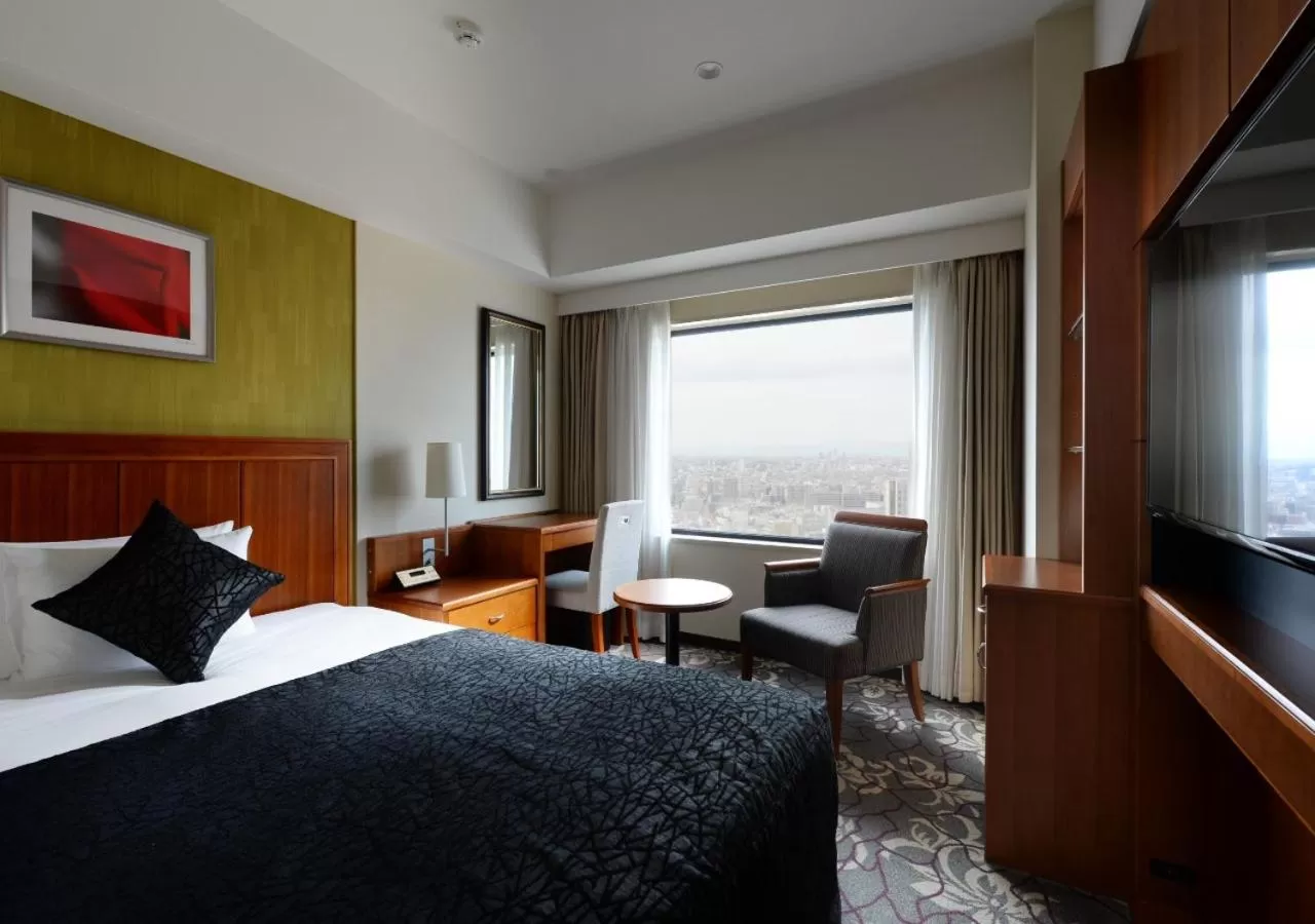 Bed in Hotel Metropolitan Tokyo Ikebukuro