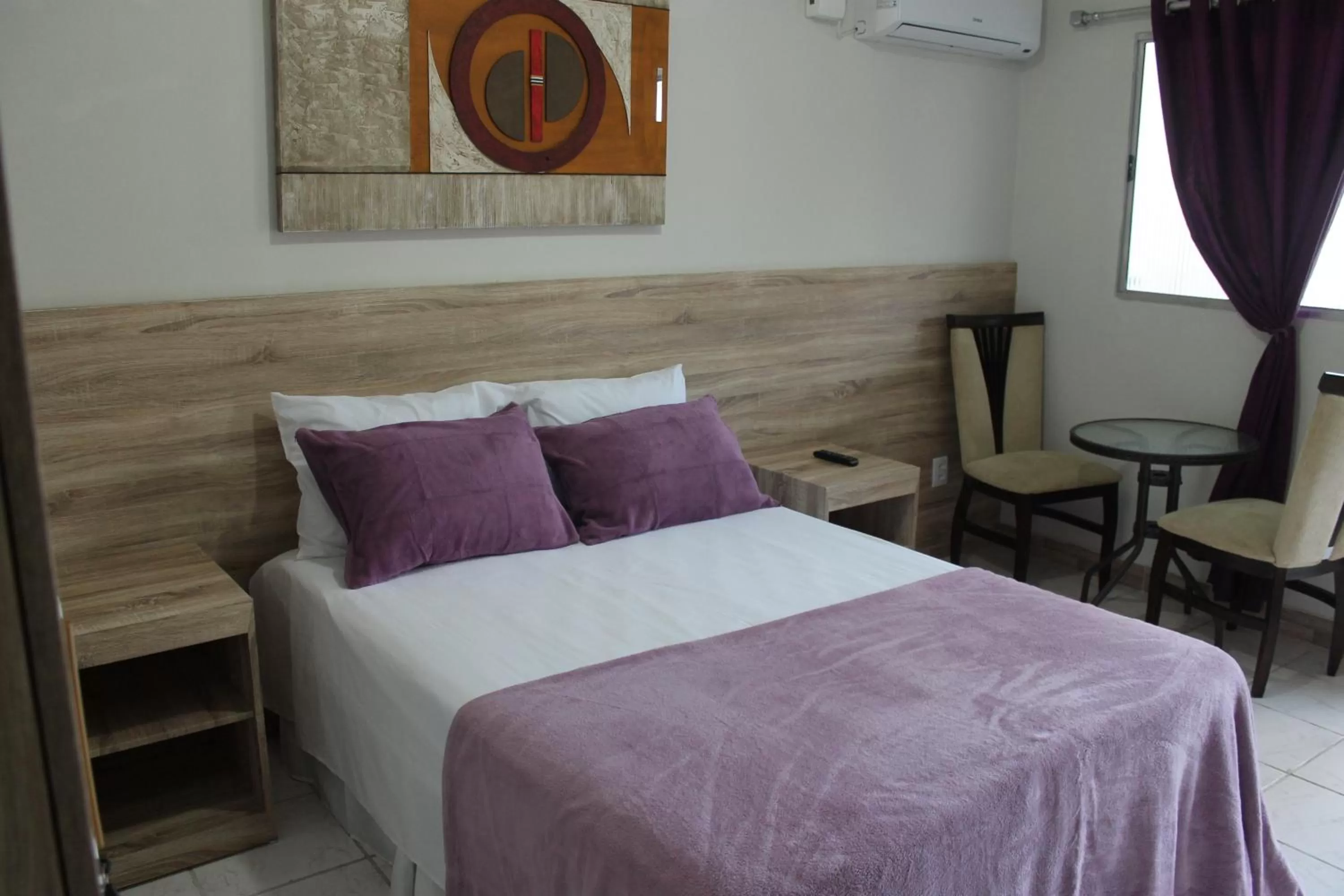 Bed in Pousada Das Palmeiras