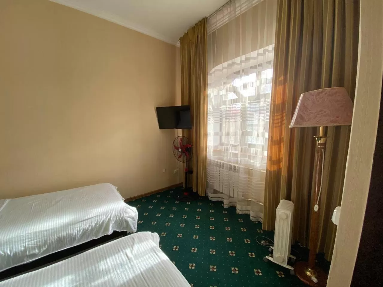 Bed in Deluxe SPA-Hotel