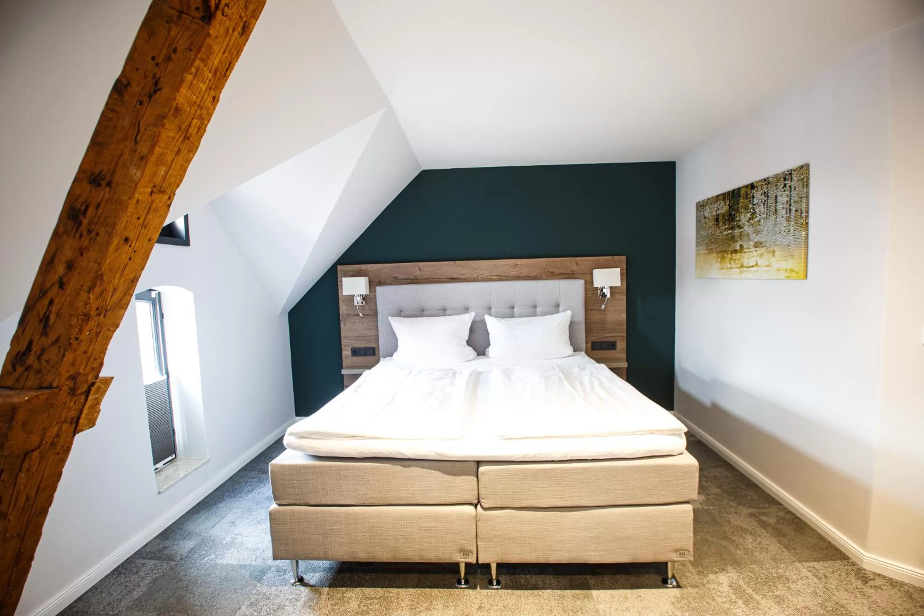 Bed in Romantik Hotel Aquarium