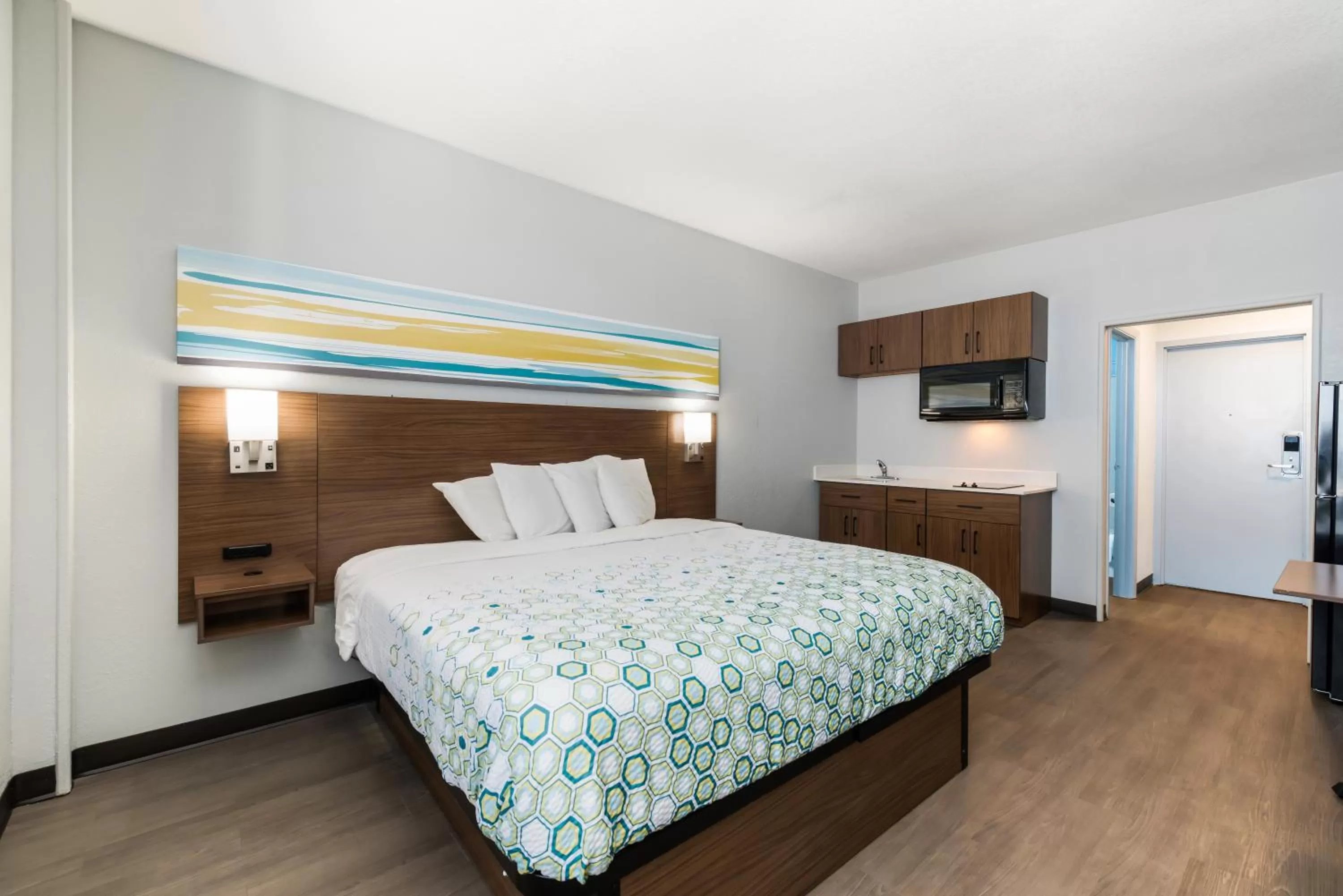 Bedroom, Bed in HomeTowne Studios by Red Roof Newport News - Hampton West