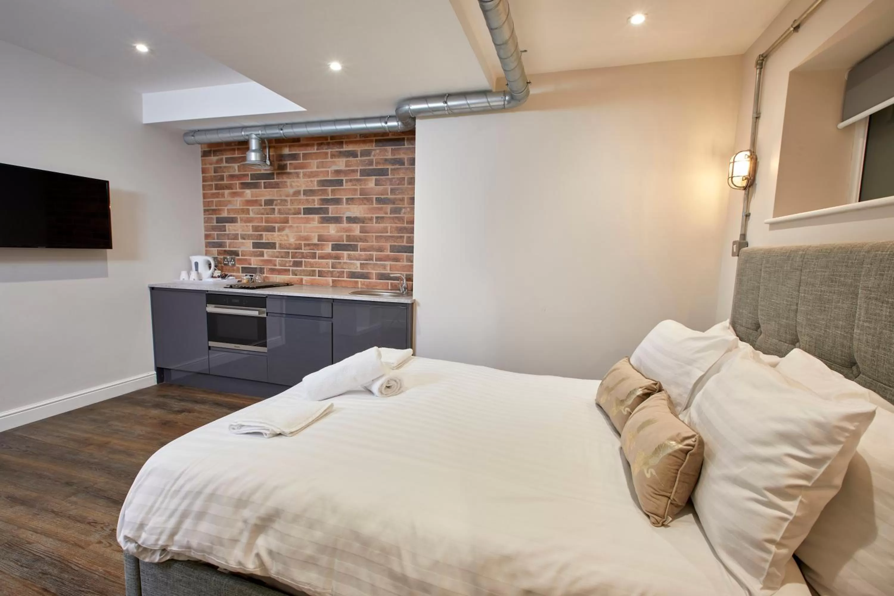 Bed in Three Cranes Serviced Apartments