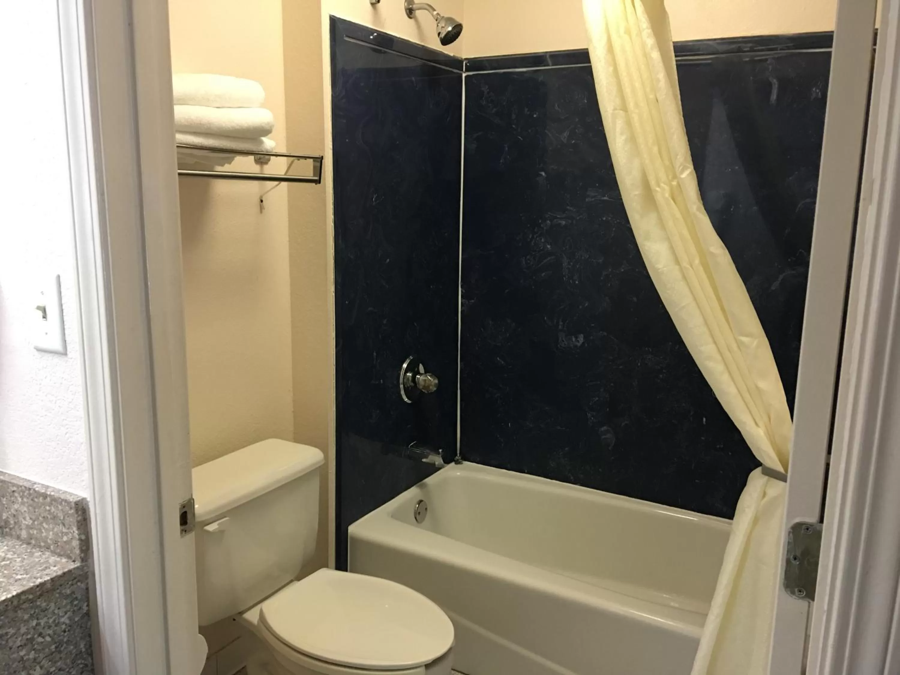 Bathroom in Super 8 by Wyndham Mobile