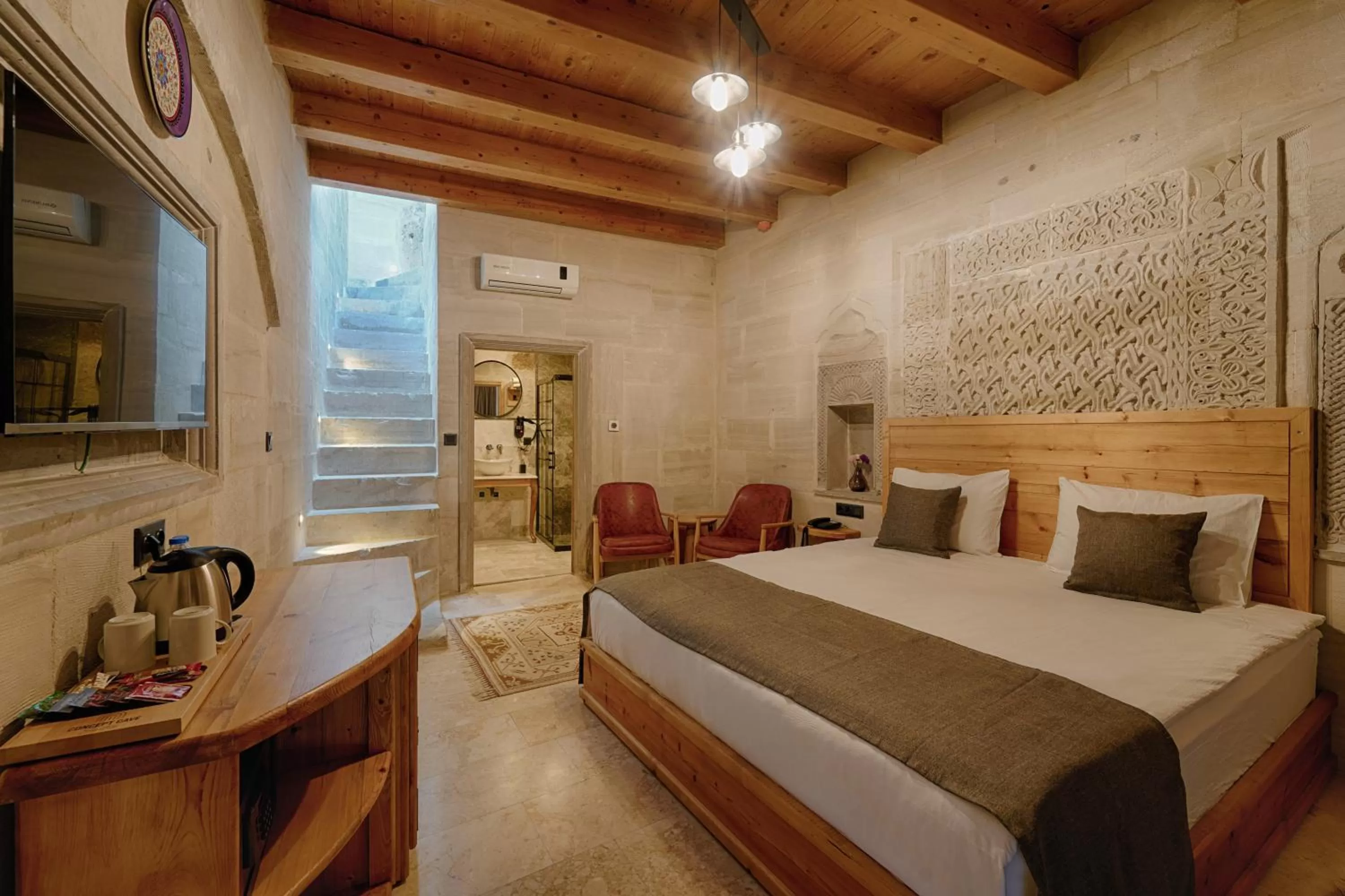 Photo of the whole room, Bed in Concept Cave House