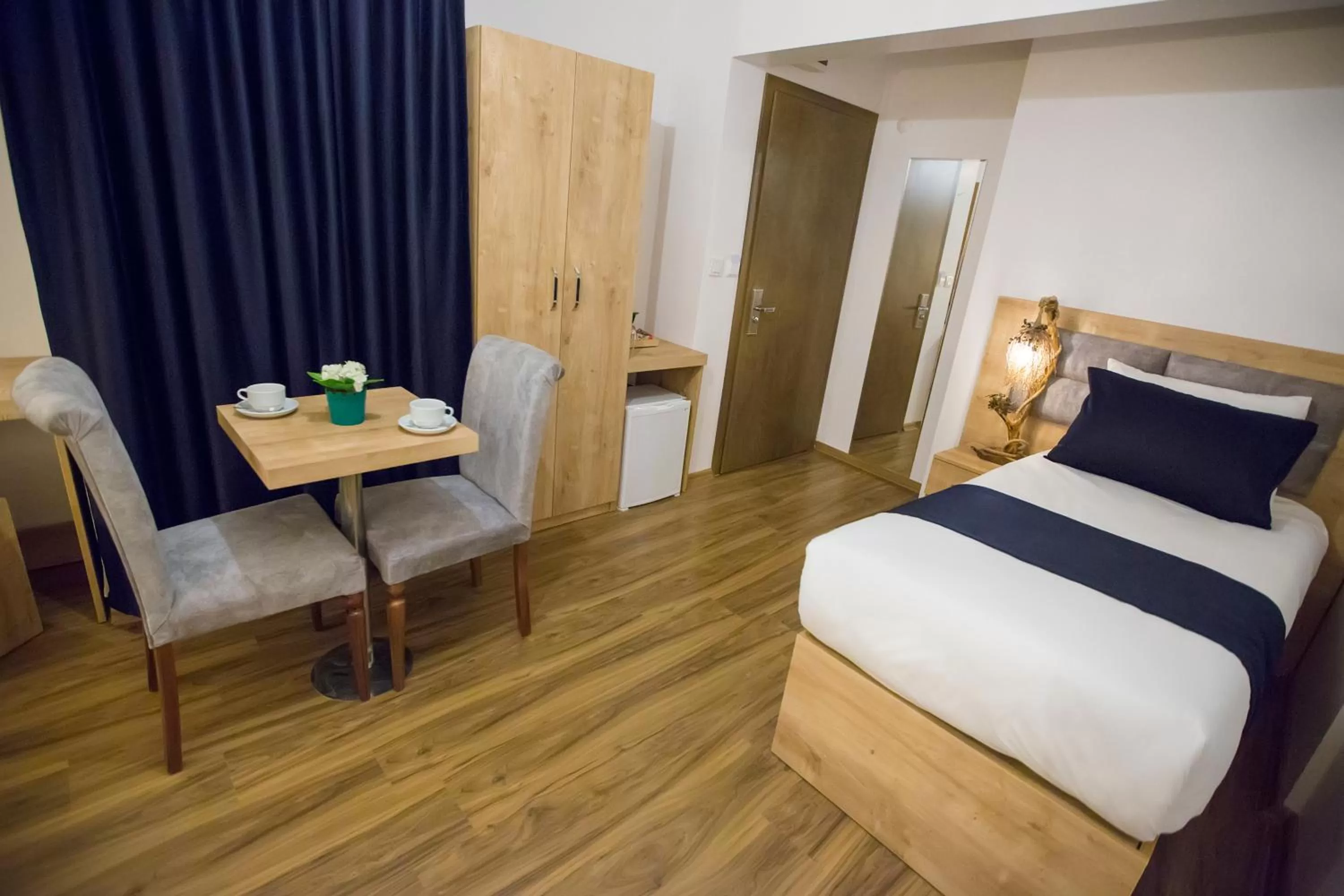 Dining area, Bed in Golden Street Hotel