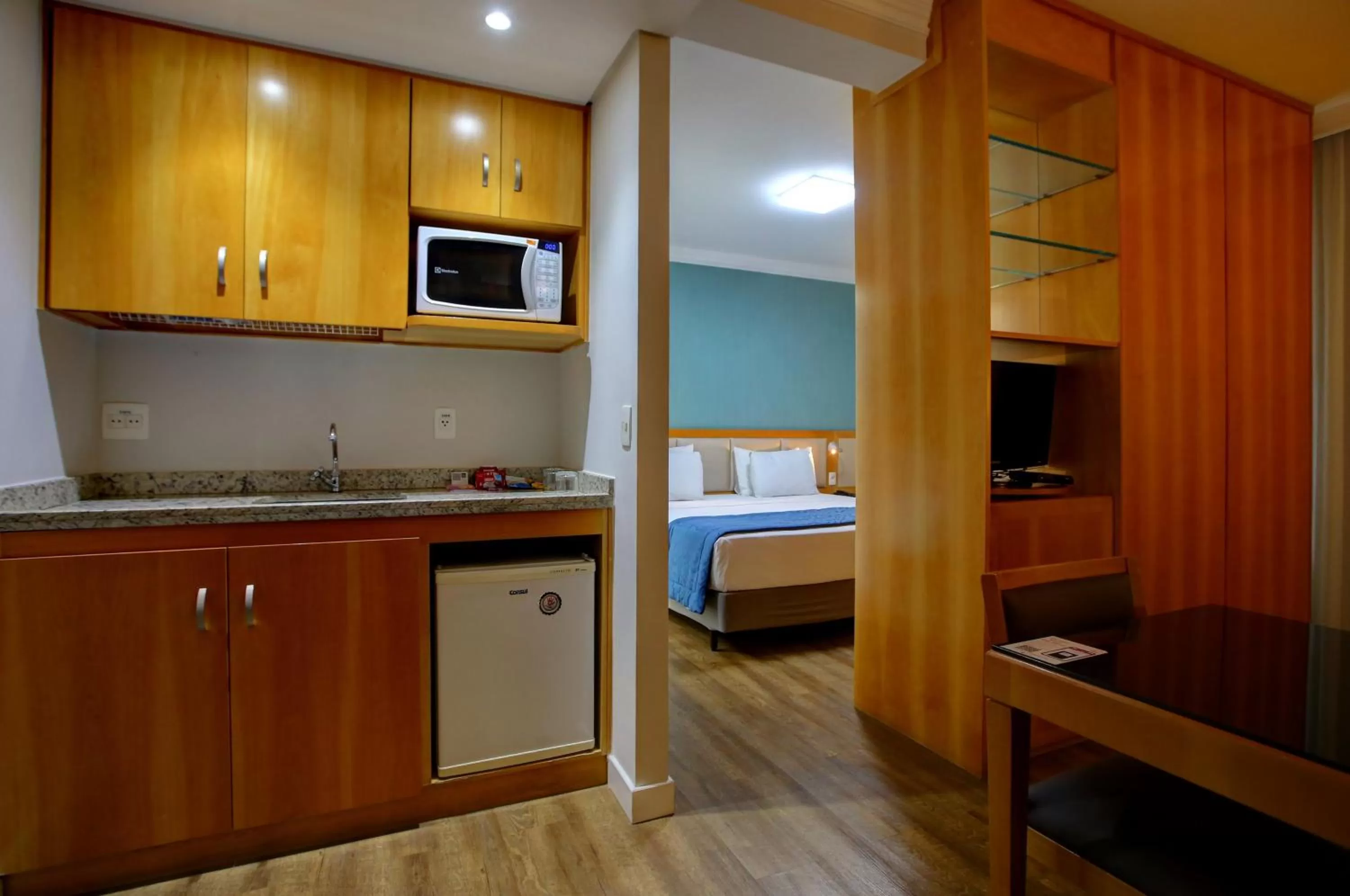 Kitchen or kitchenette, Bed in Quality Suítes Oscar Freire