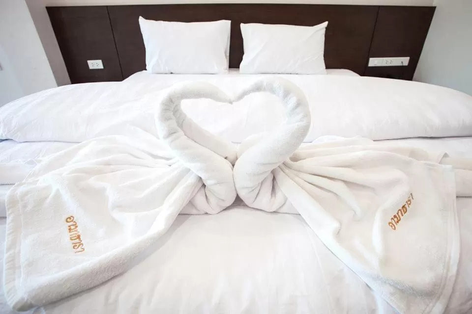 Bed in Amatara Hotel