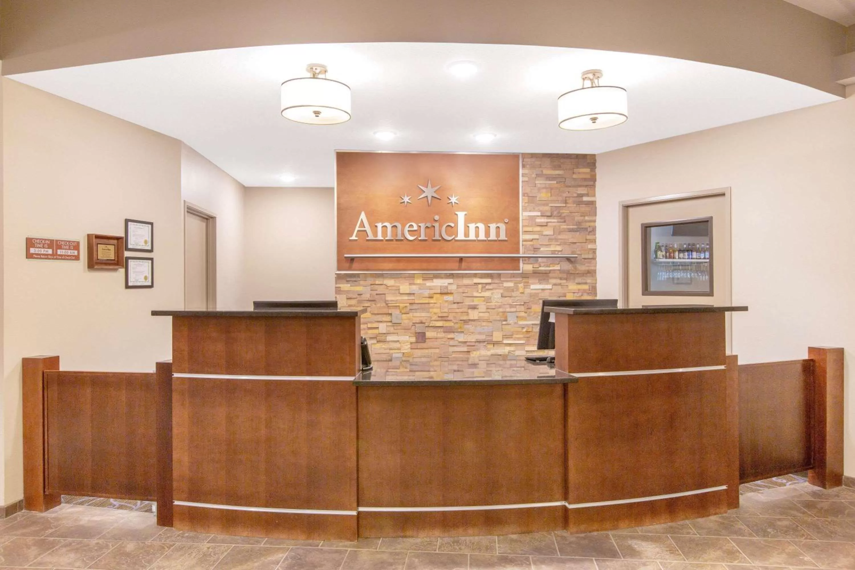 Lobby or reception in AmericInn by Wyndham Humboldt