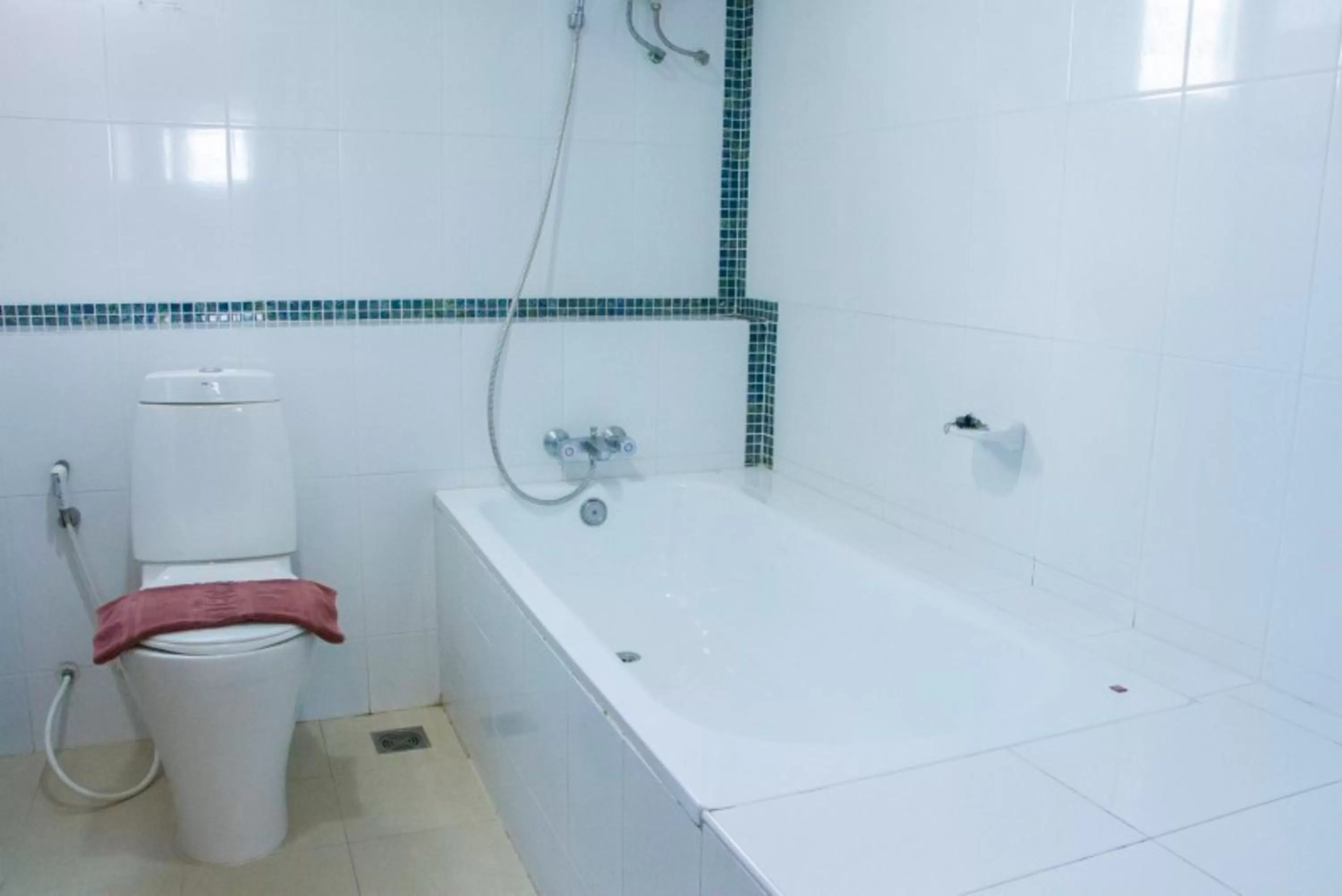 Bathroom in Convenient Grand Hotel