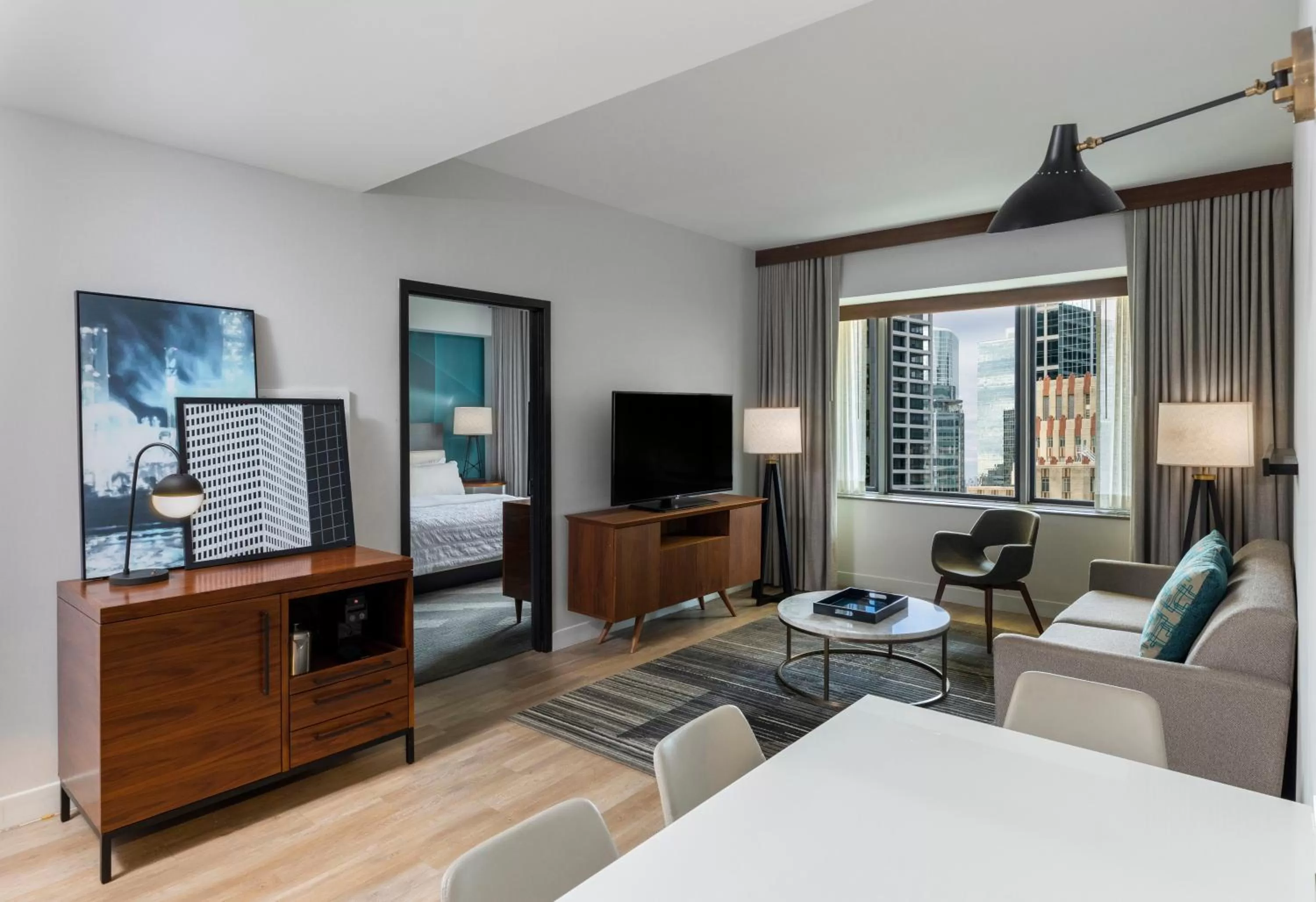 Living room, Bed in Le Meridien Houston Downtown