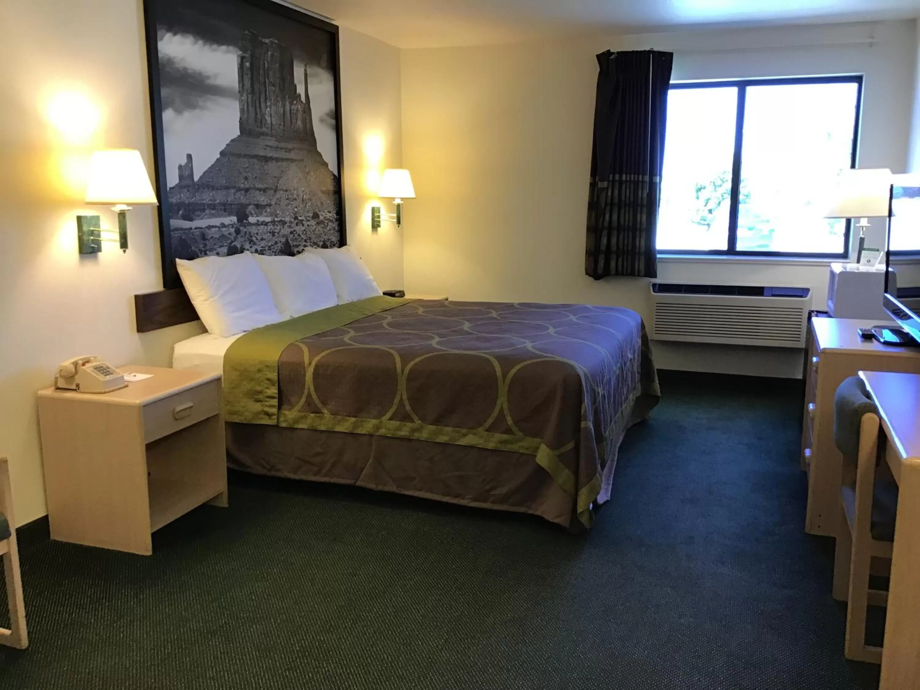 Bed in Arch Canyon Inn