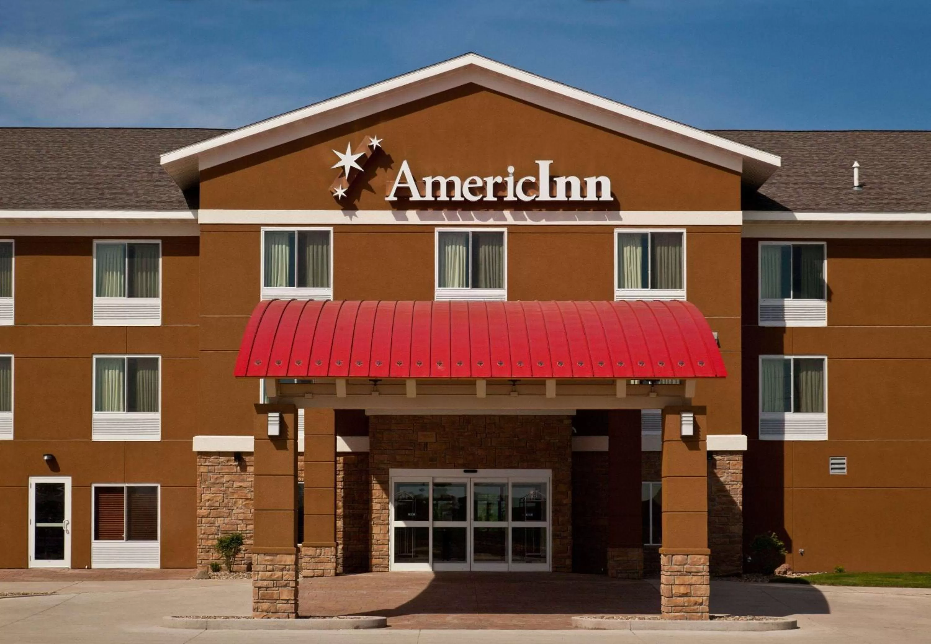 Property building in AmericInn by Wyndham Fairfield