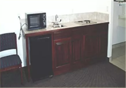 Kitchen or kitchenette in Texas Inn & Suites