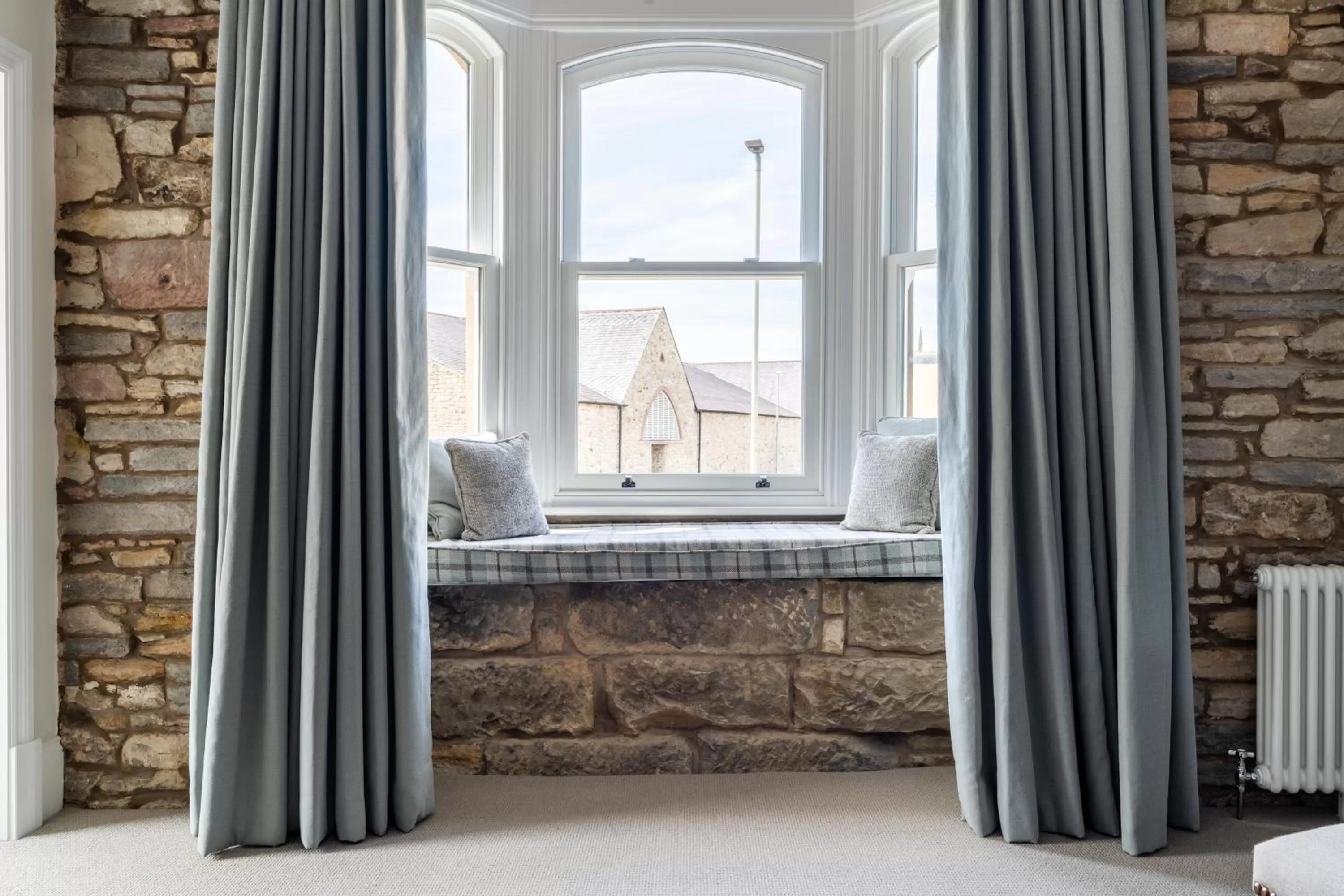 Seating area in Tithe Barn - Self Check In Hotel