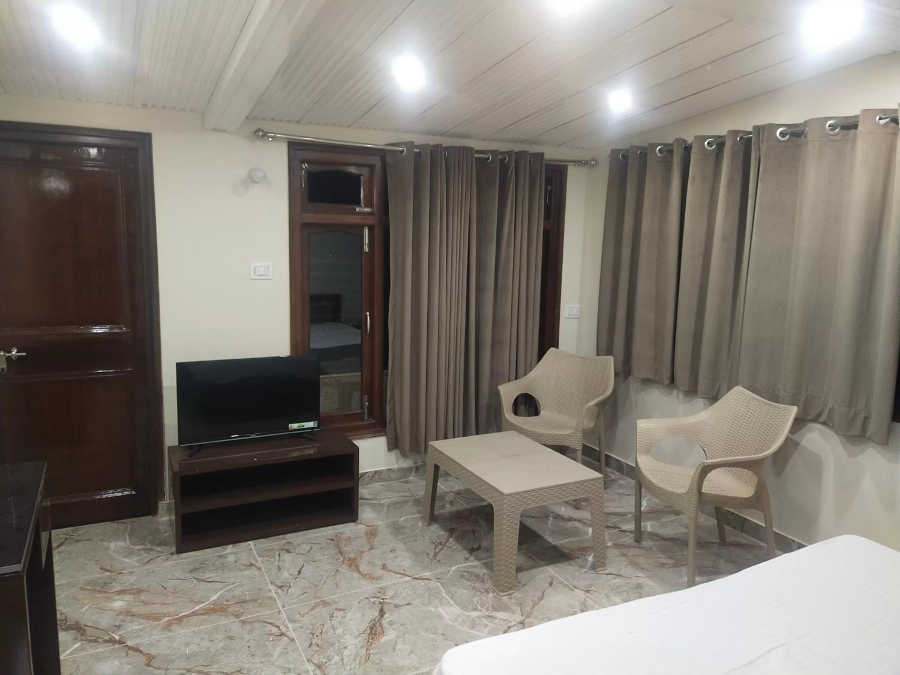 TV and multimedia, Seating Area in Dhanlaxmi Apartments