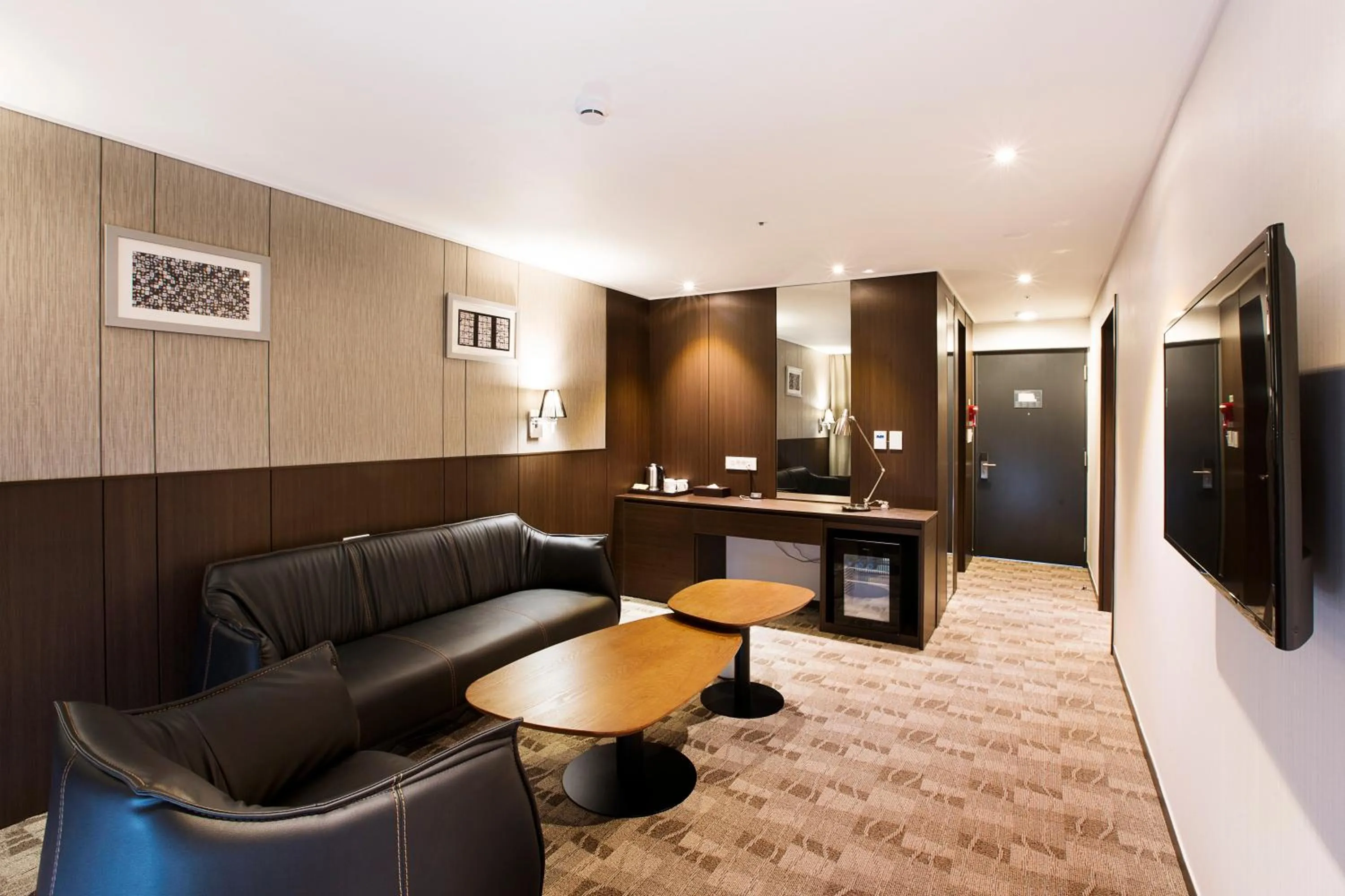 Living room in Ramada by Wyndham Jeju City Hall
