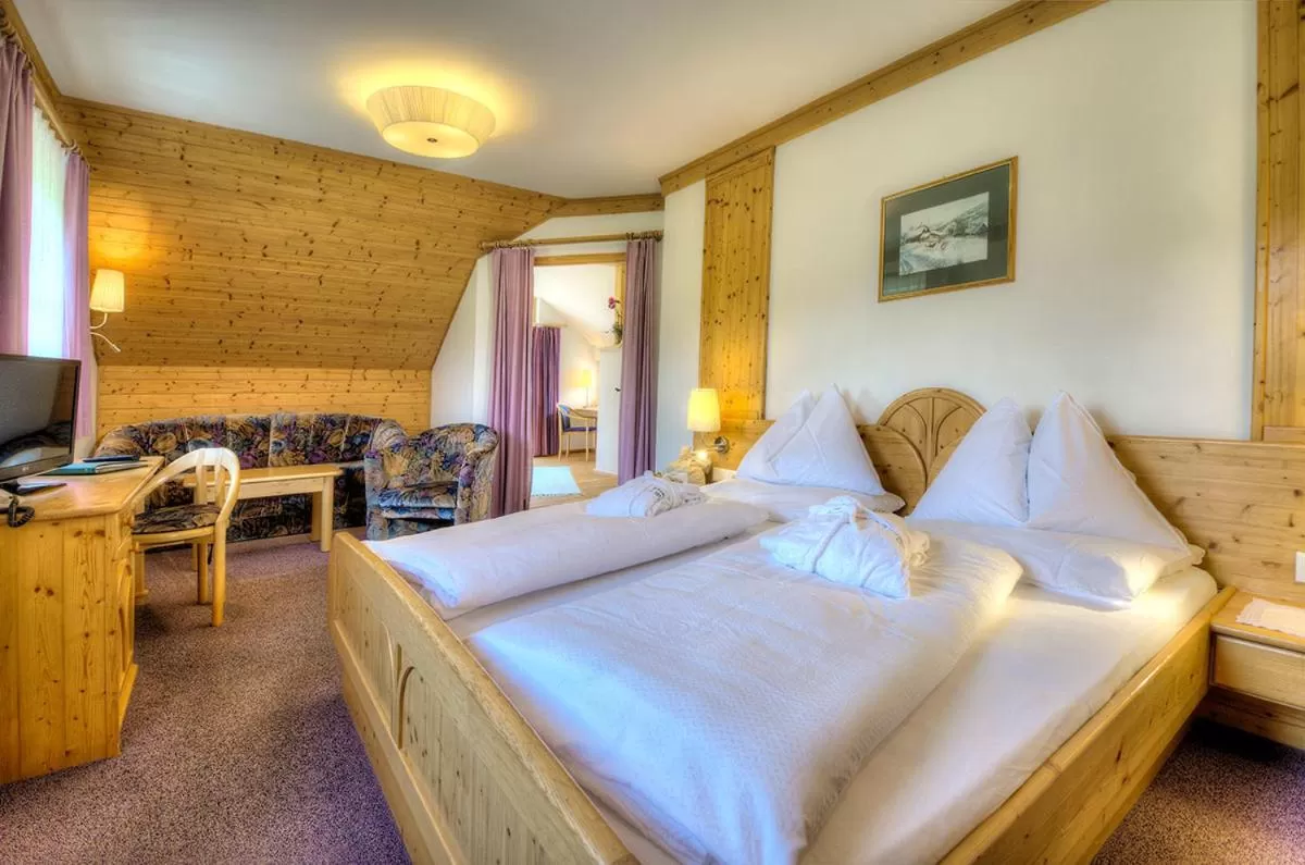 Bed in Hotel Häuserl im Wald