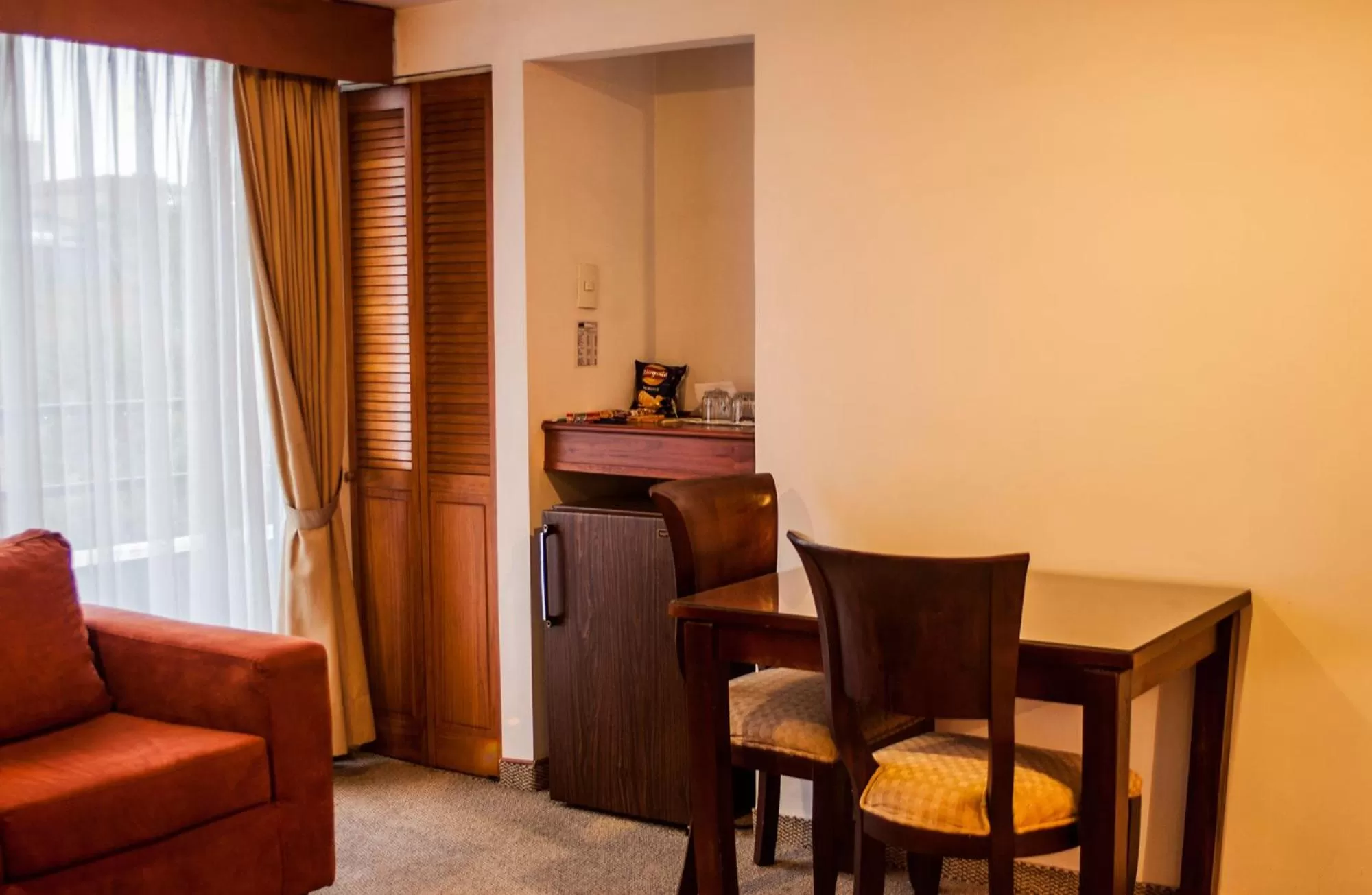 Seating area in Apartaestudios Los Andes