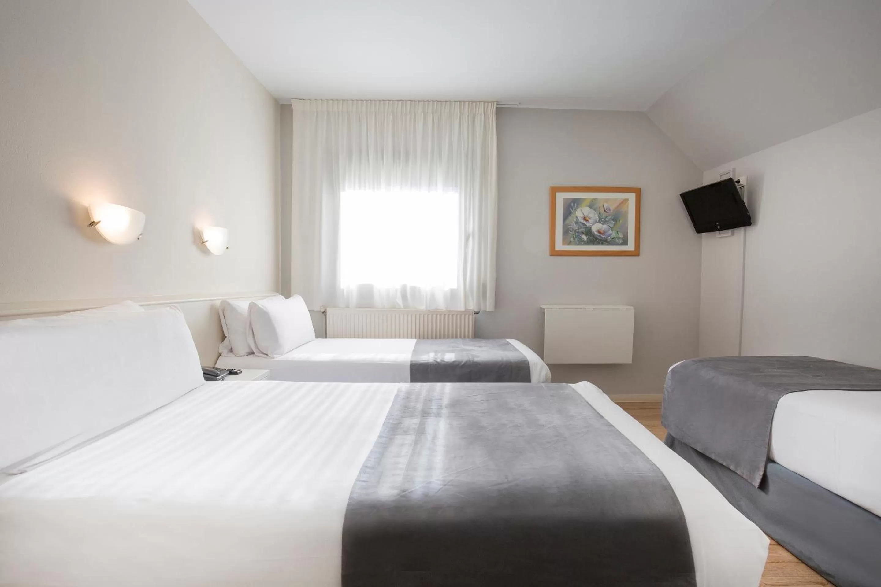 Bed in Hotel Camellot by Nexta