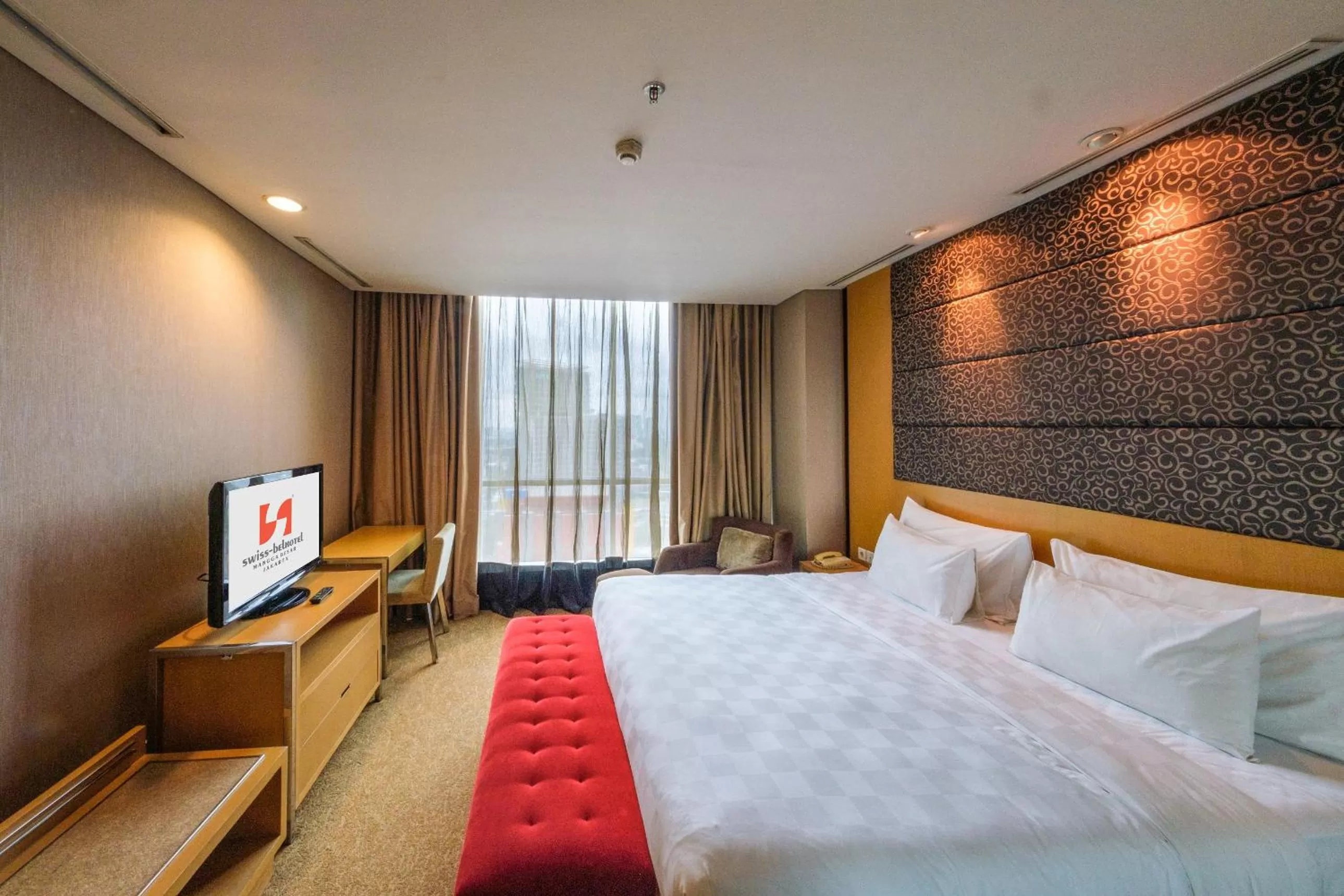 Bed in Swiss-Belhotel Mangga Besar