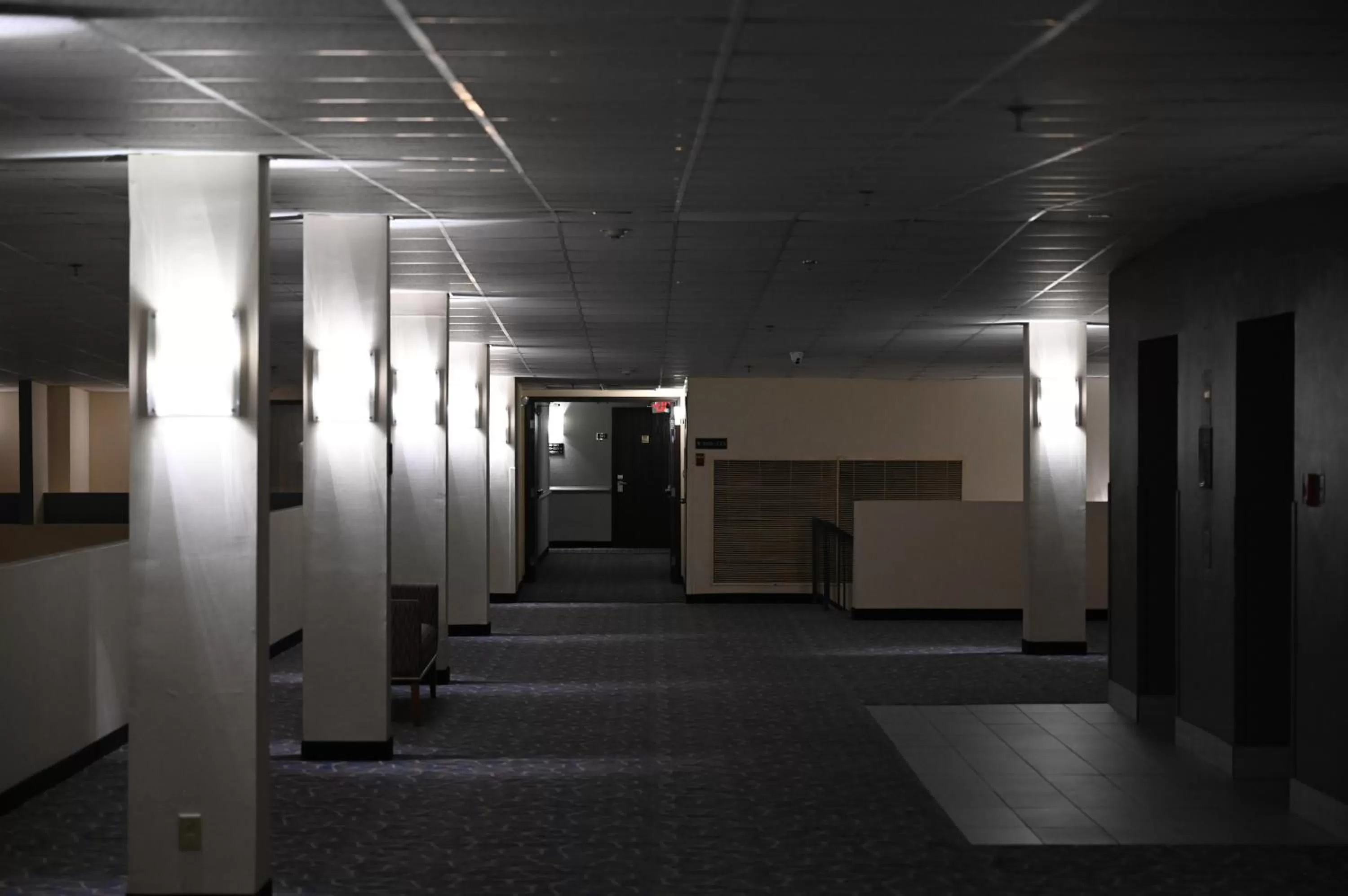 Property building in Atrium Hotel and Suites DFW Airport