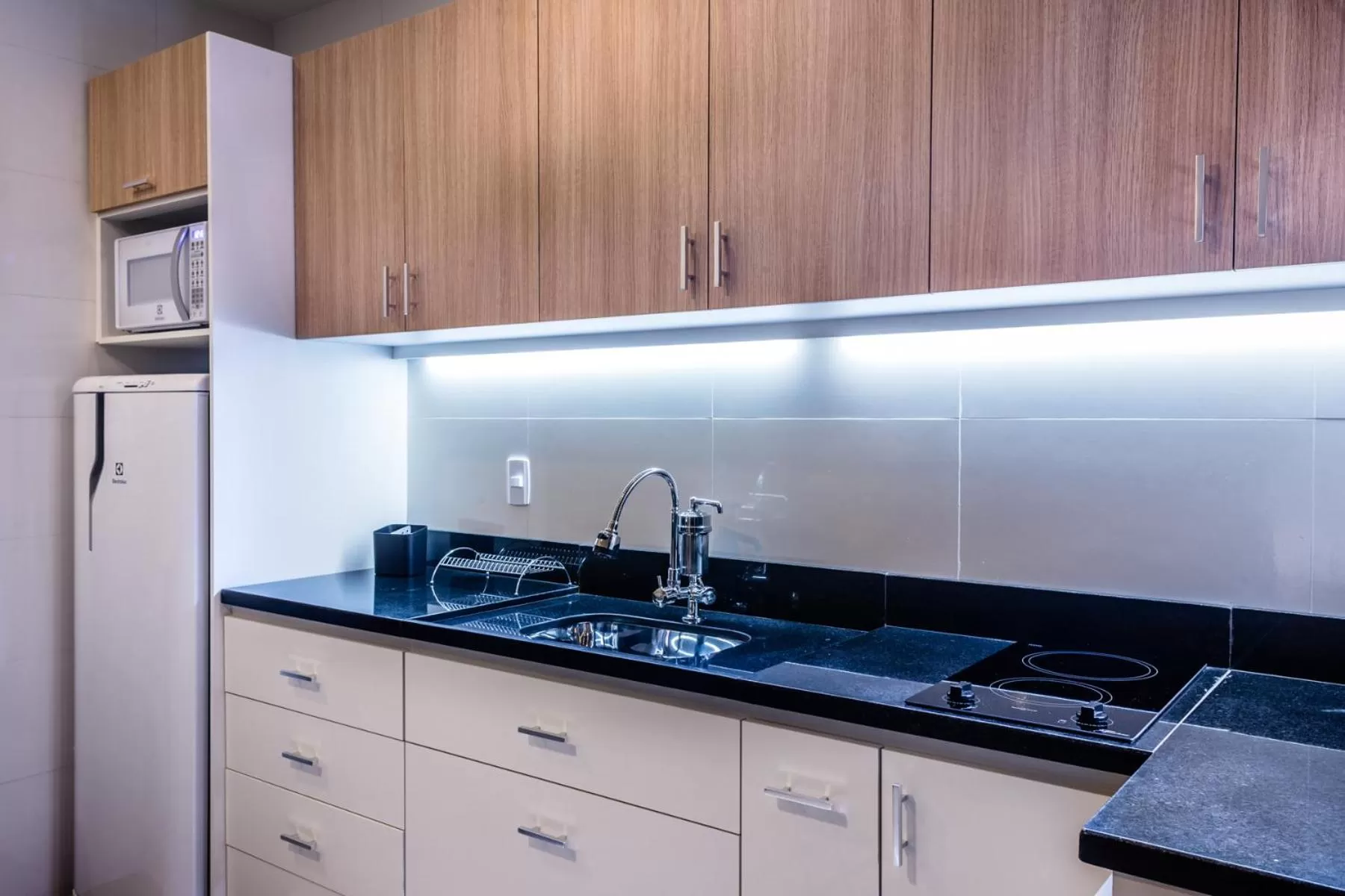 Kitchen or kitchenette, Kitchen/Kitchenette in Injoy Suítes & Aparts