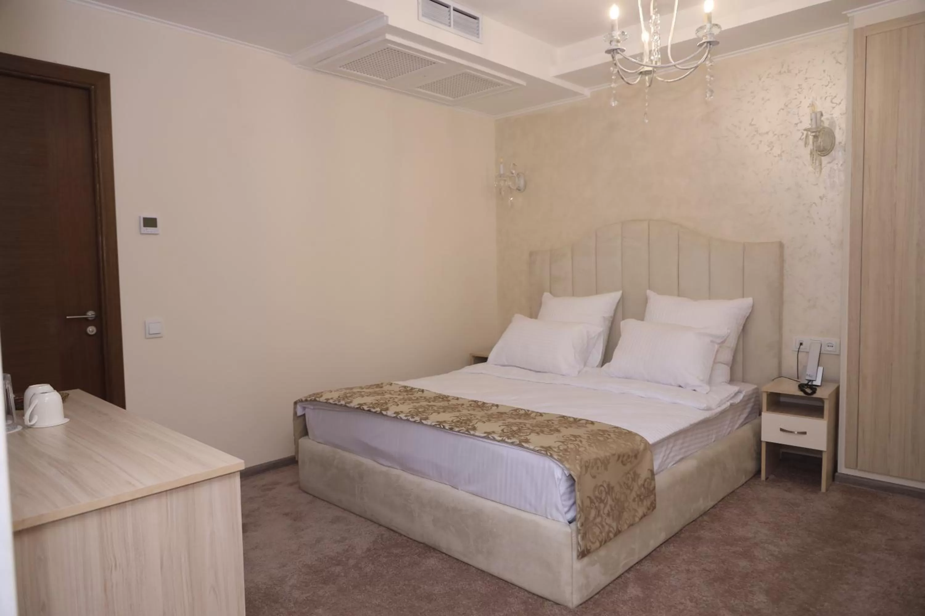 Bed in DeLin Hotel And Tours