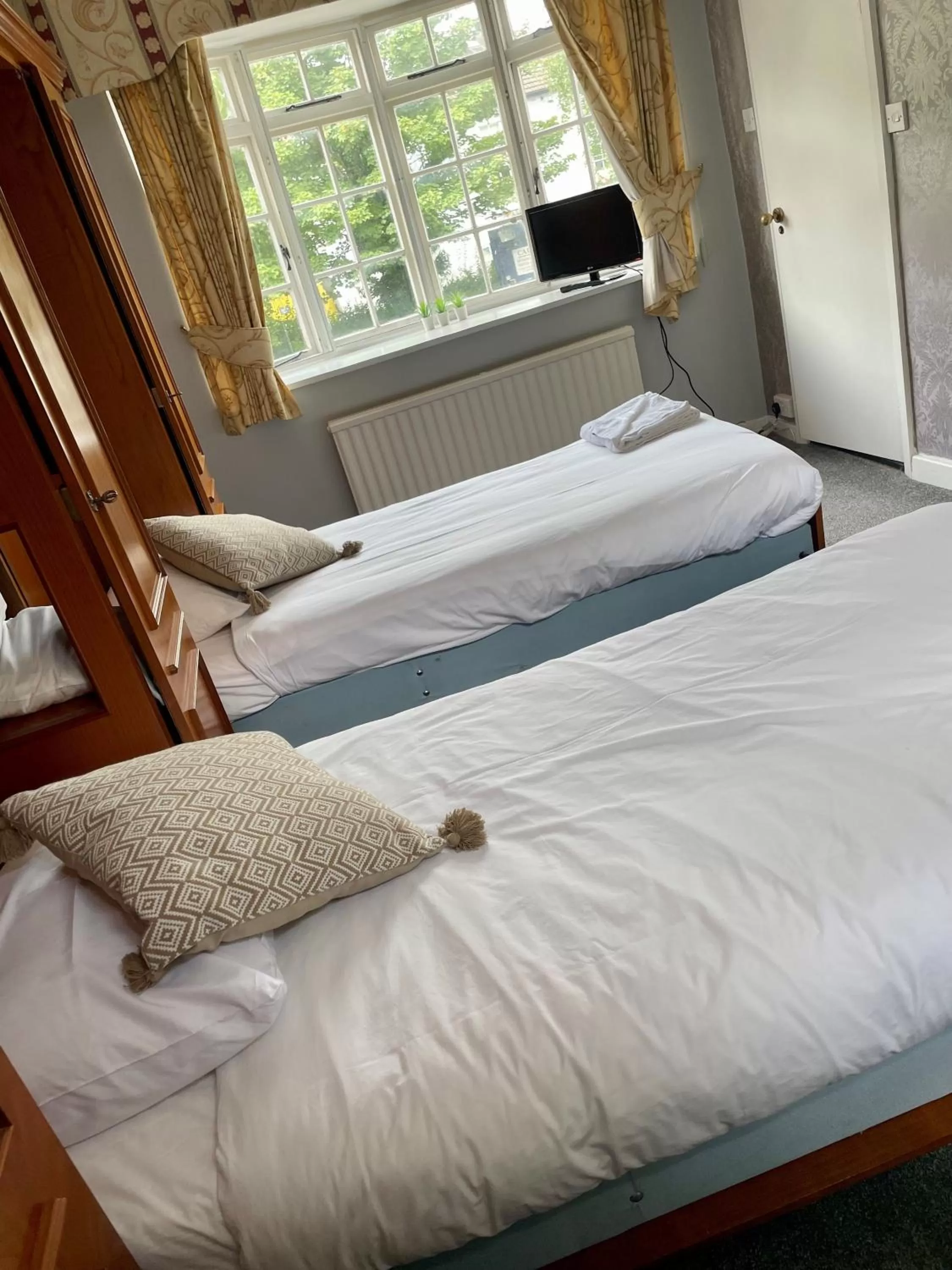 Bed in Donington Manor Hotel