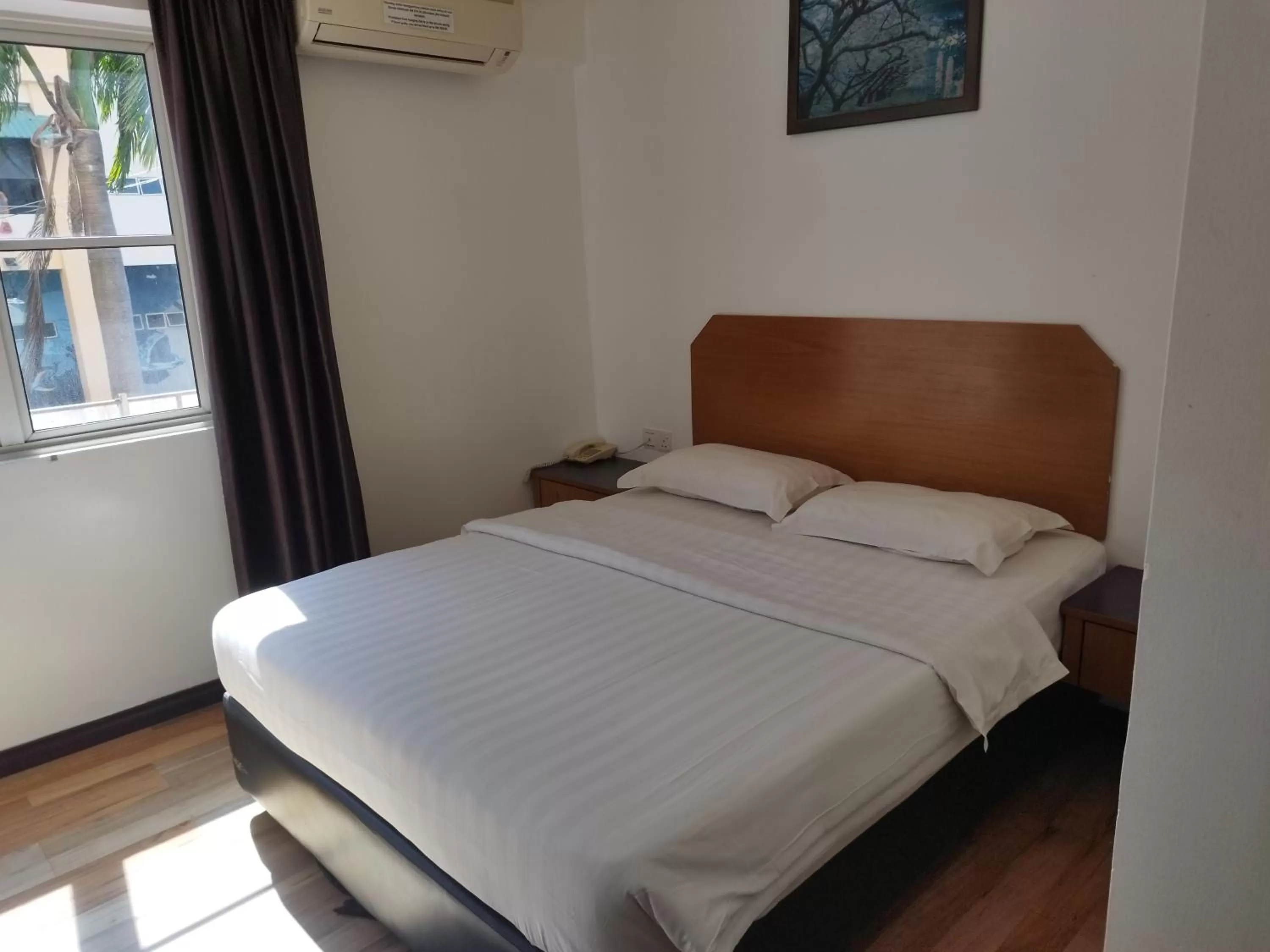 Bed in Marine Bay Hotel