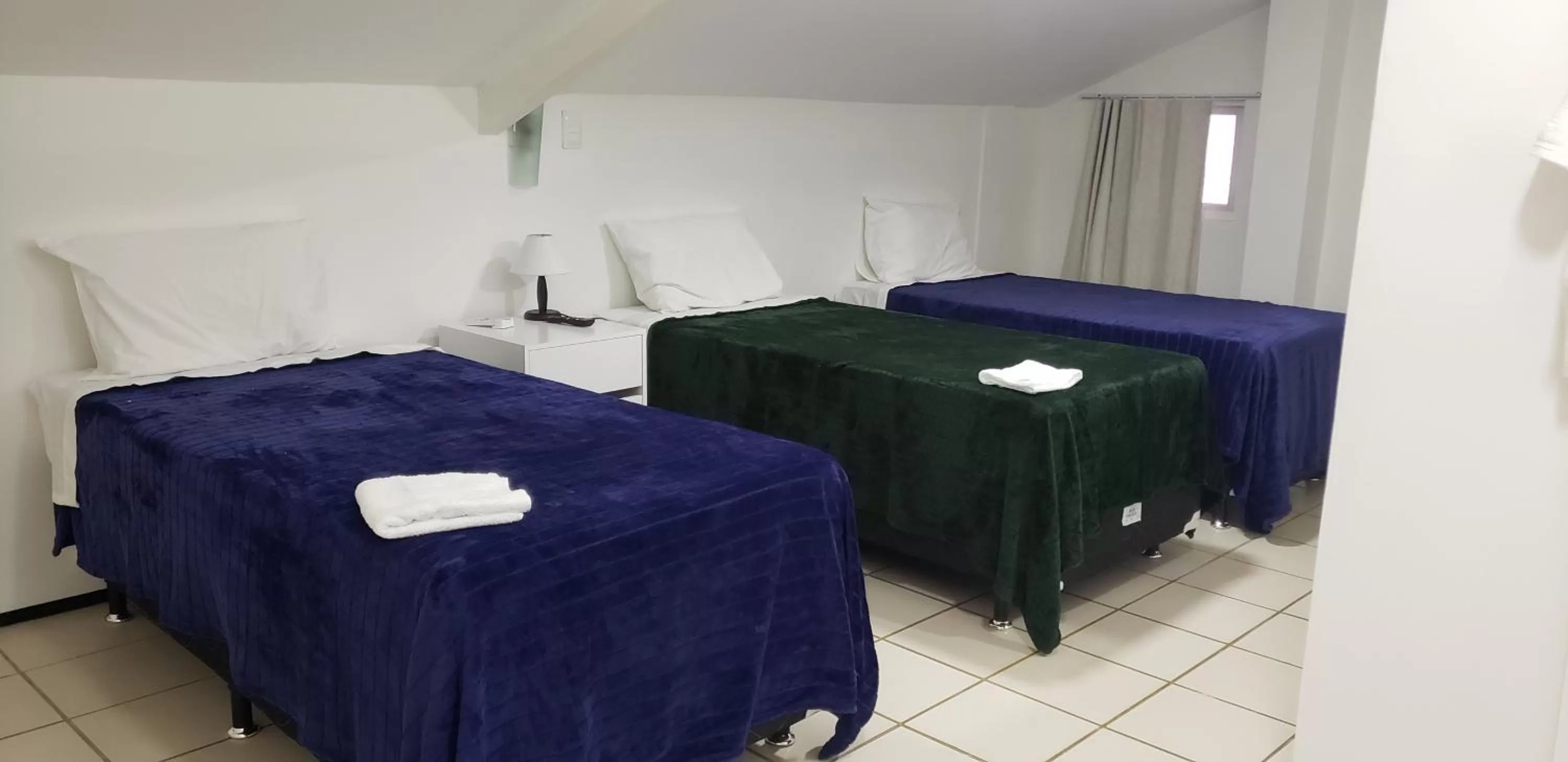 Bed in LIVE IN FORTALEZA HOTEL