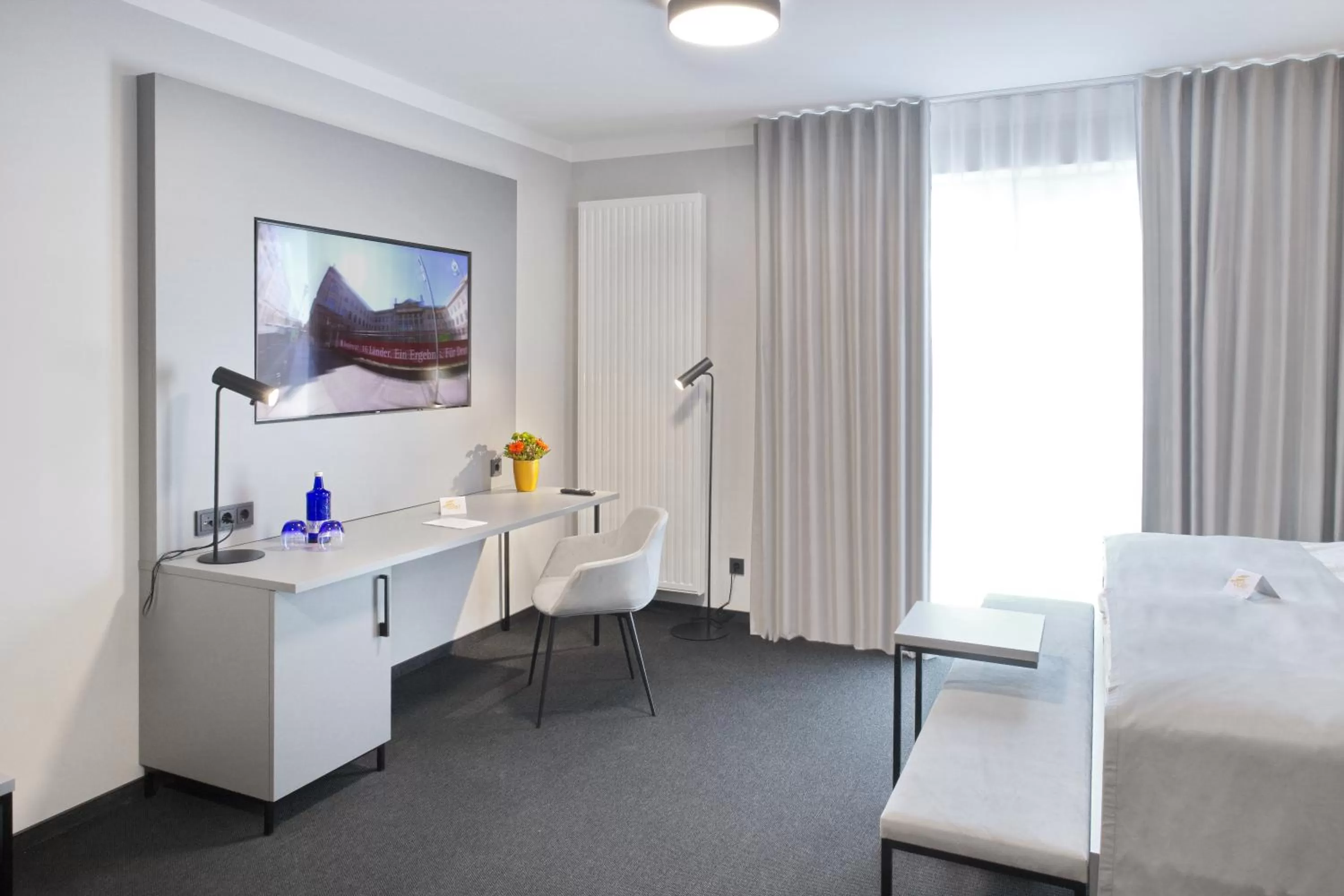 Seating area, Bed in Hotel Adler Münster