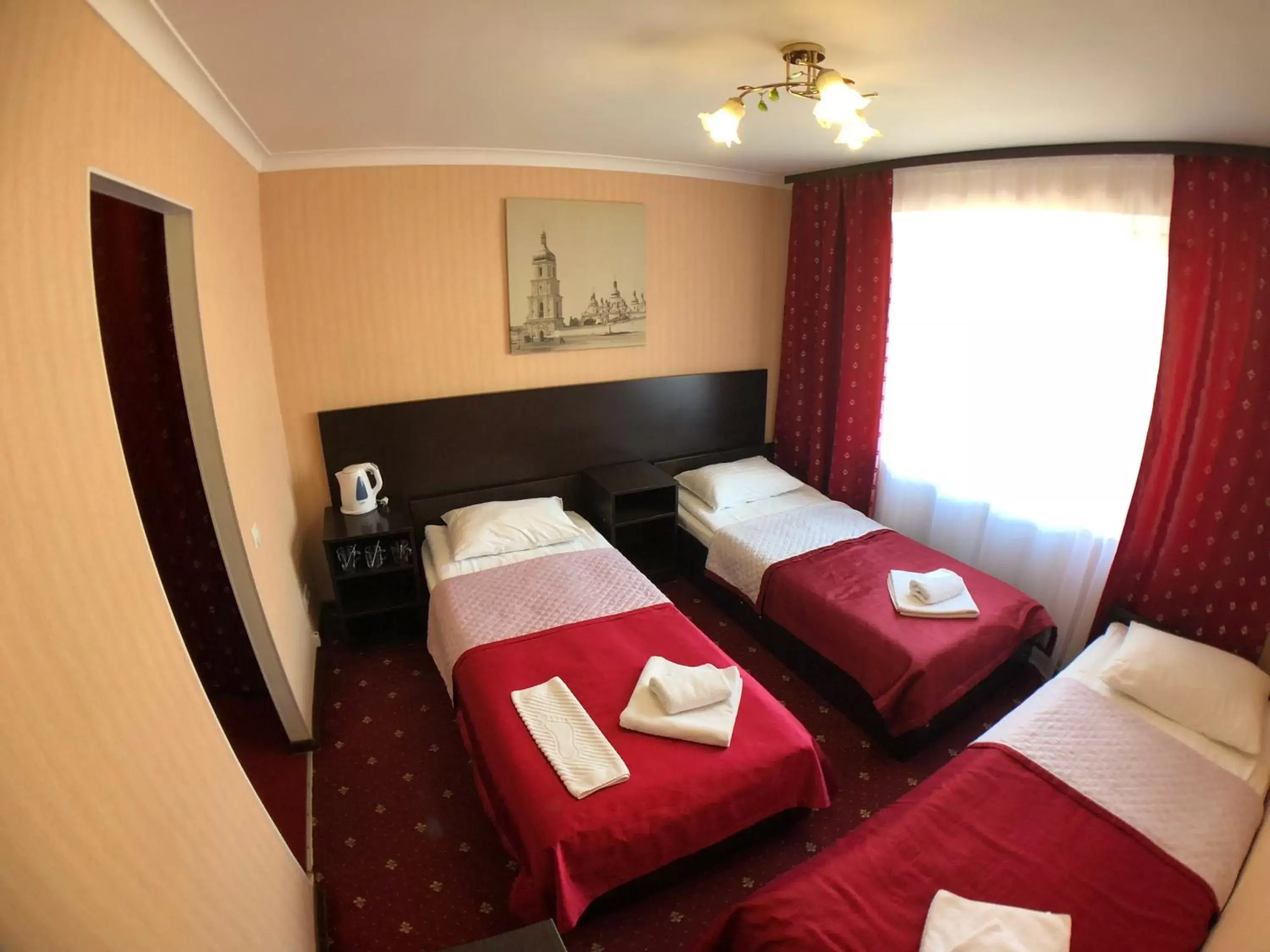 Standard Triple Room in Hotel Nivki Standard Triple Room in Hotel Nivki