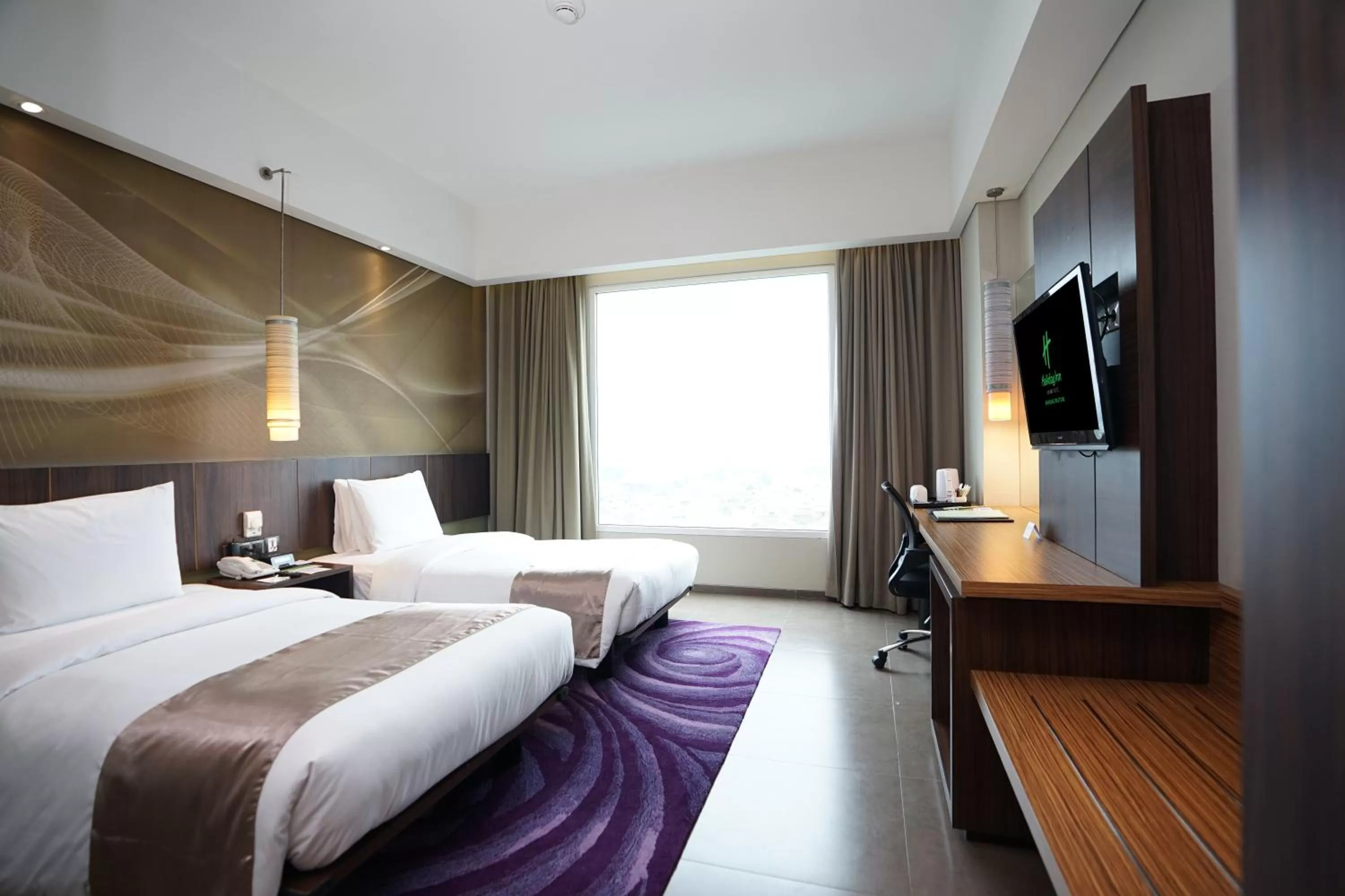 Bed in Holiday Inn Bandung Pasteur by IHG