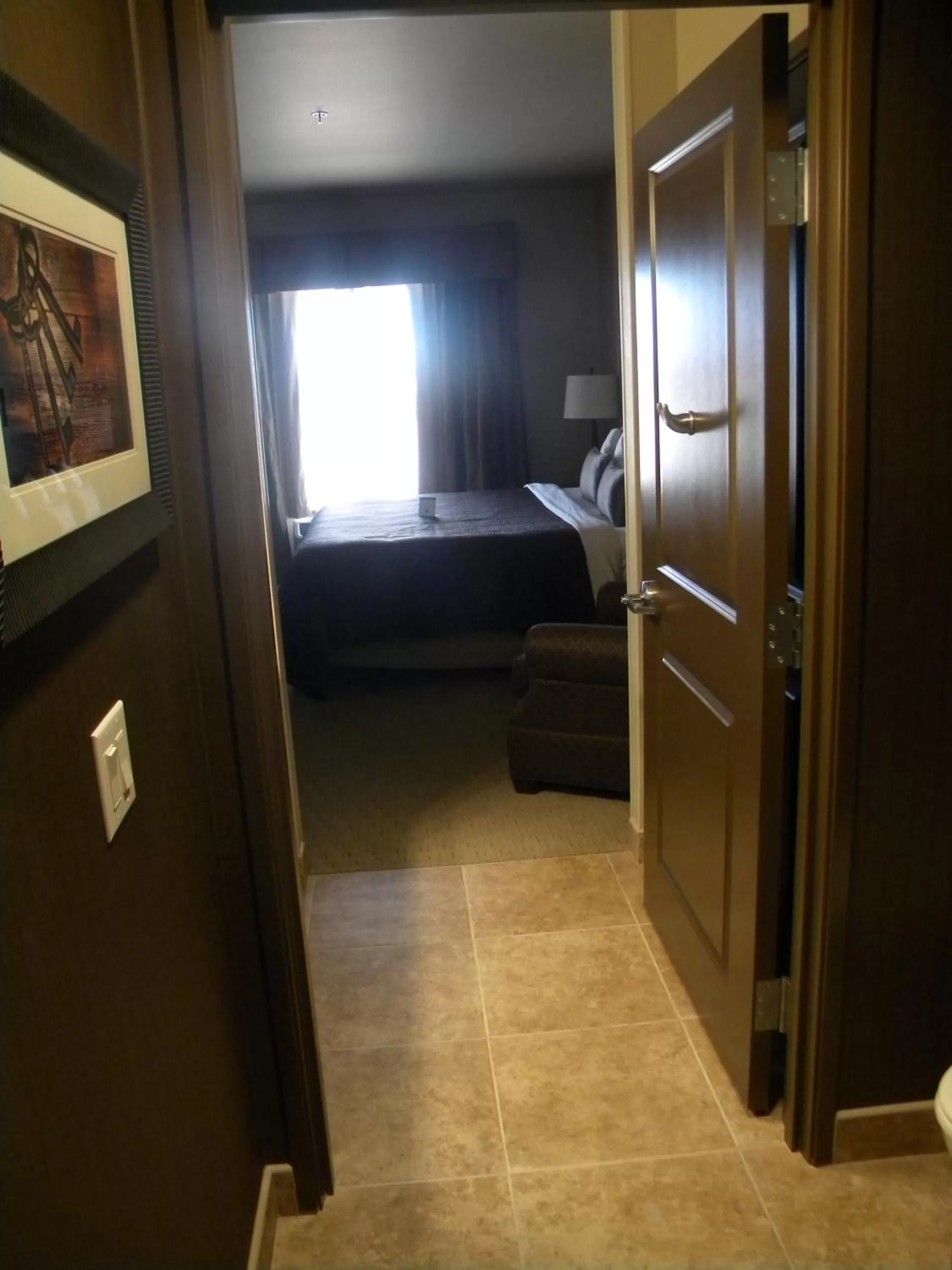 Bed in Teddy's Residential Suites Watford City