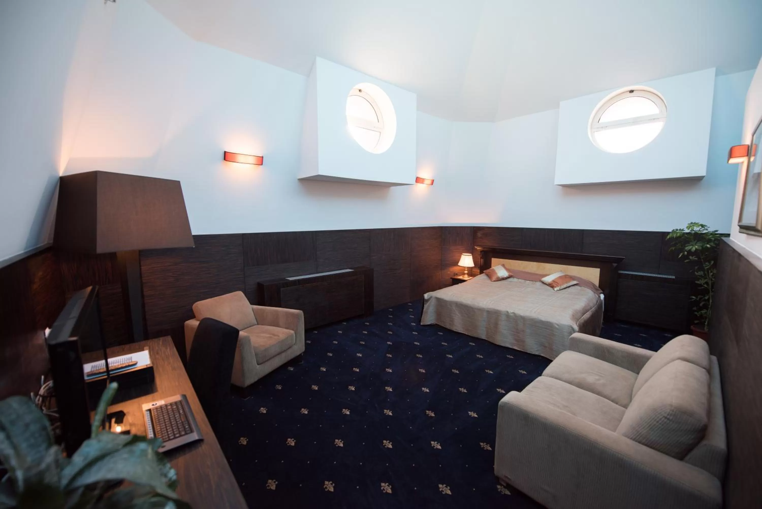 Living room, Bed in Hotel Europe