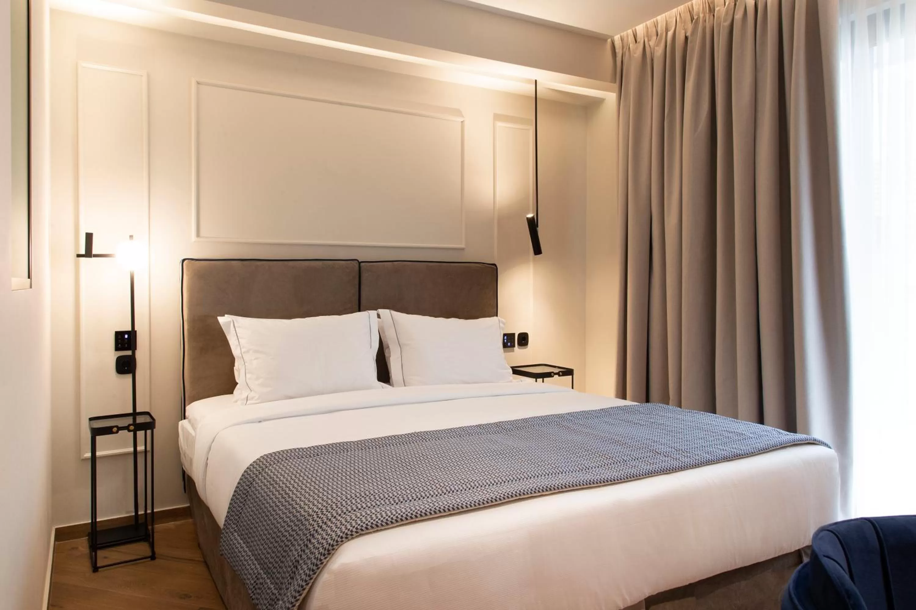 Bed in 1910 Lifestyle Hotel