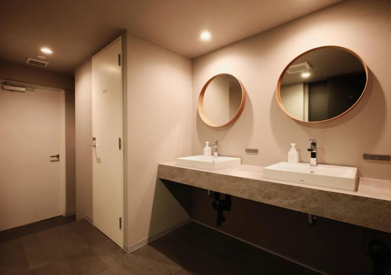 Shower in Hotel Graphy Nezu