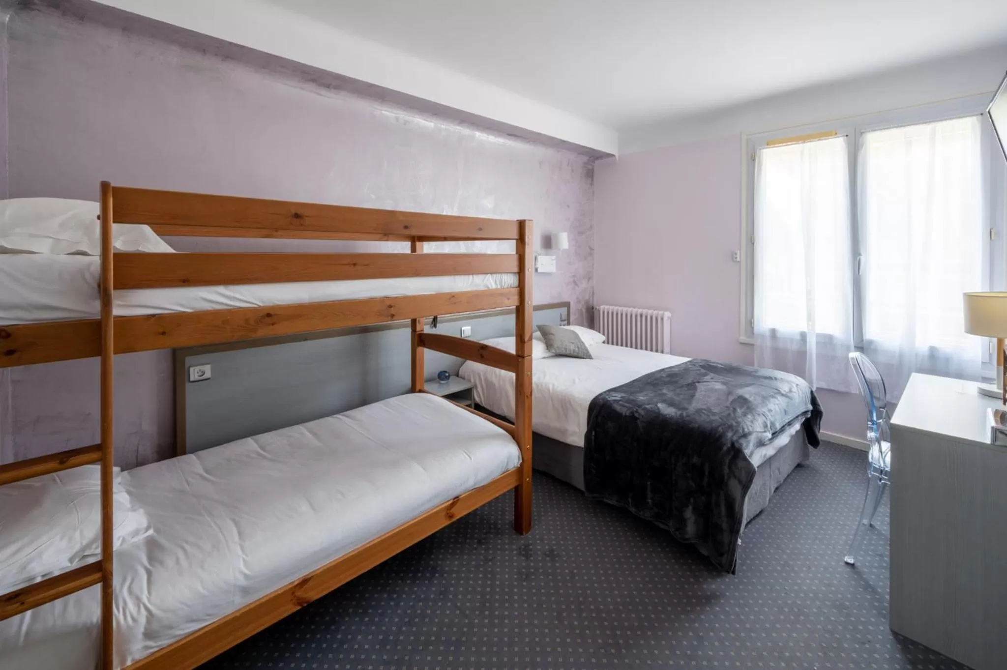 Bed in Hôtel du Soleil Levant