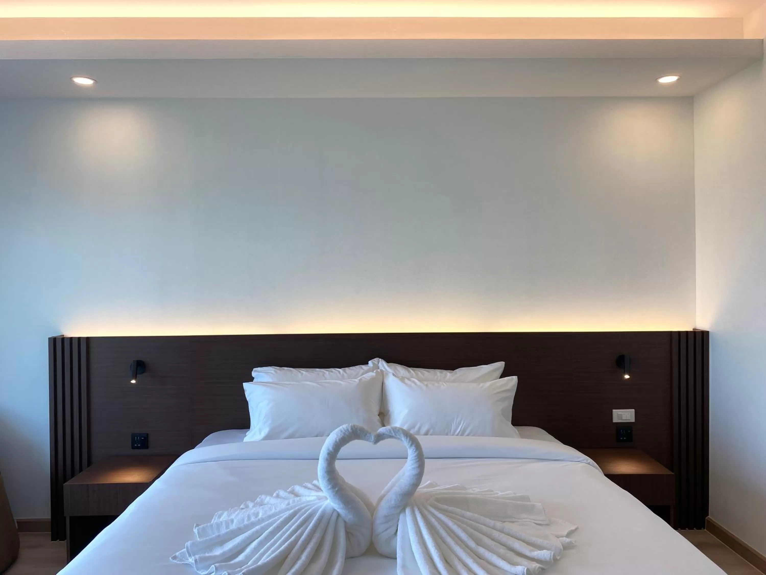 Bed in GEEN Hotel Chonburi