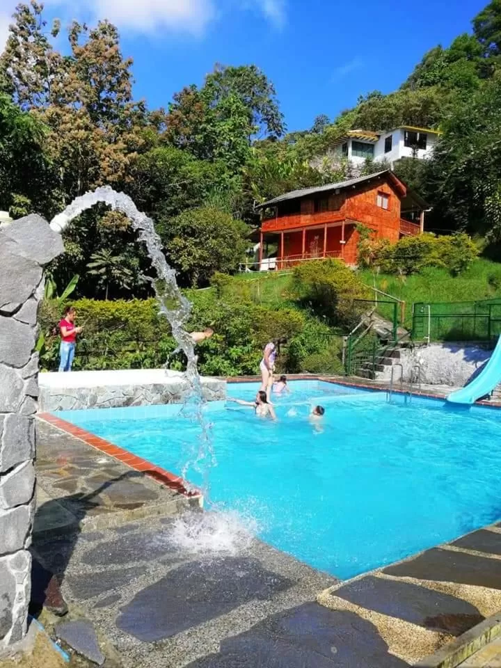 Property building, Swimming Pool in Eco Lodge La Juanita
