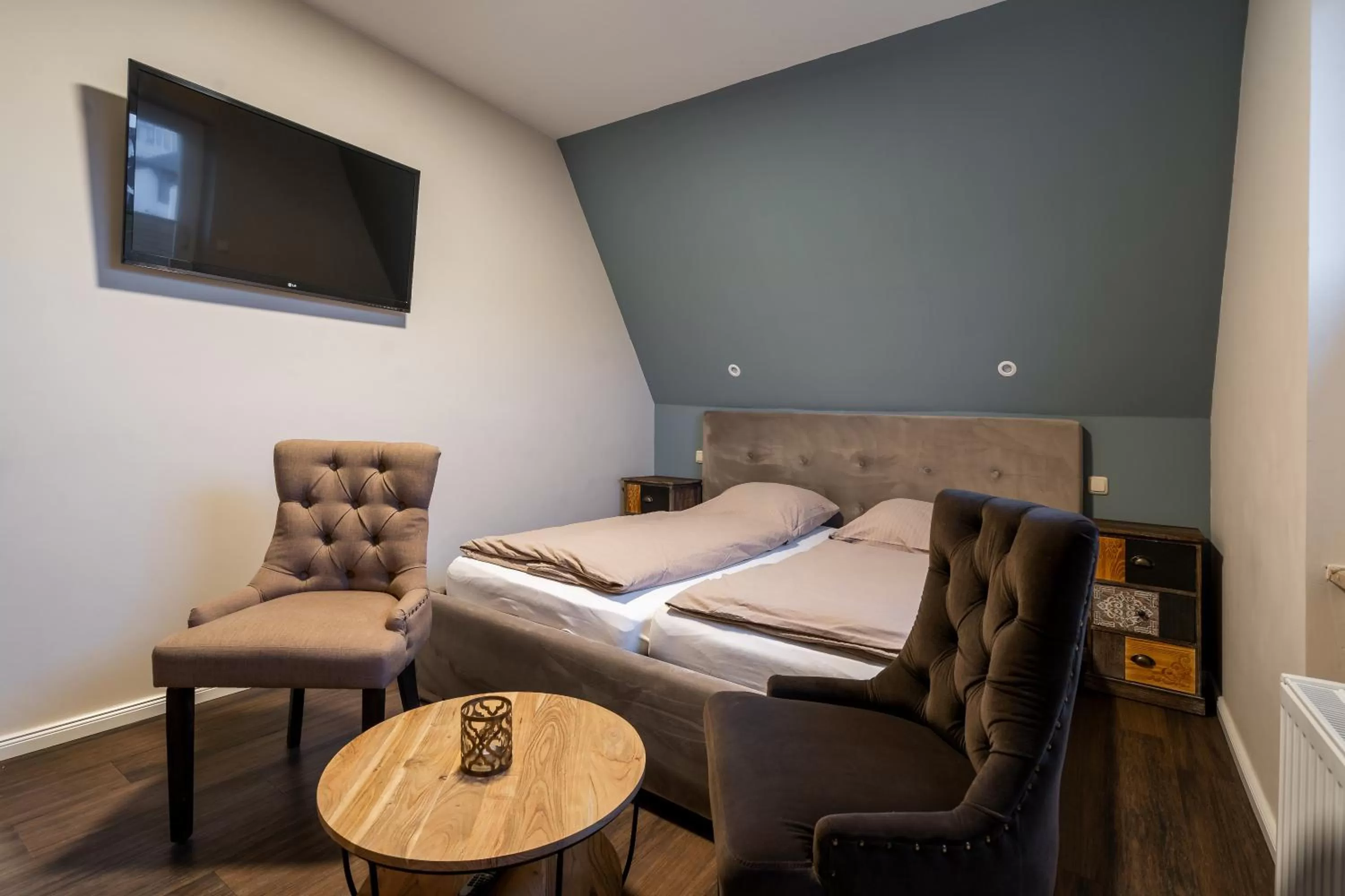 Photo of the whole room, TV/Entertainment Center in Hotel Luina Beach